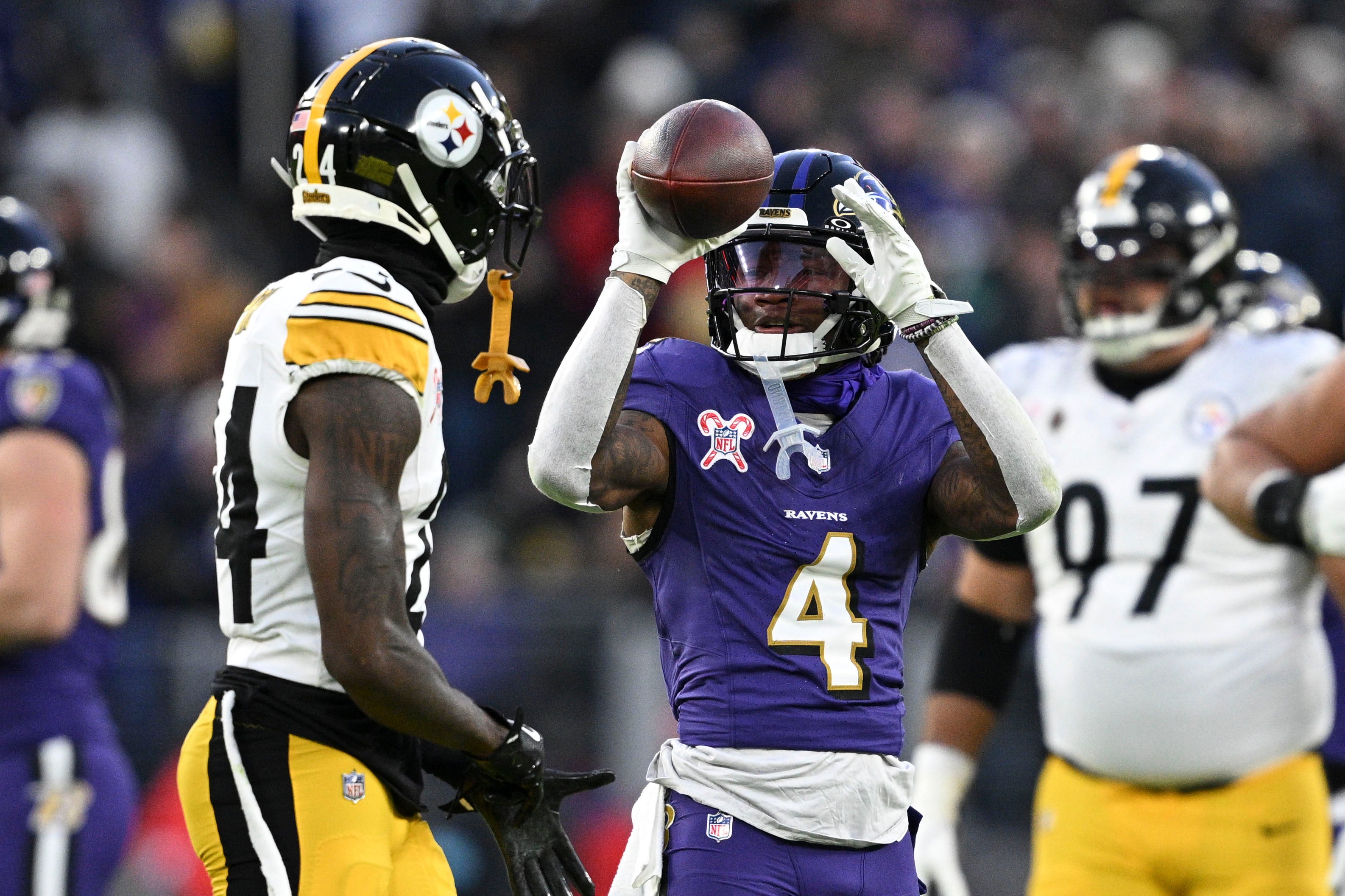 Dec 21, 2024; Baltimore, Maryland, USA; Baltimore Ravens wide receiver Zay Flowers (4) reacts after running for a first down against the Pittsburgh Steelers at M&T Bank Stadium.