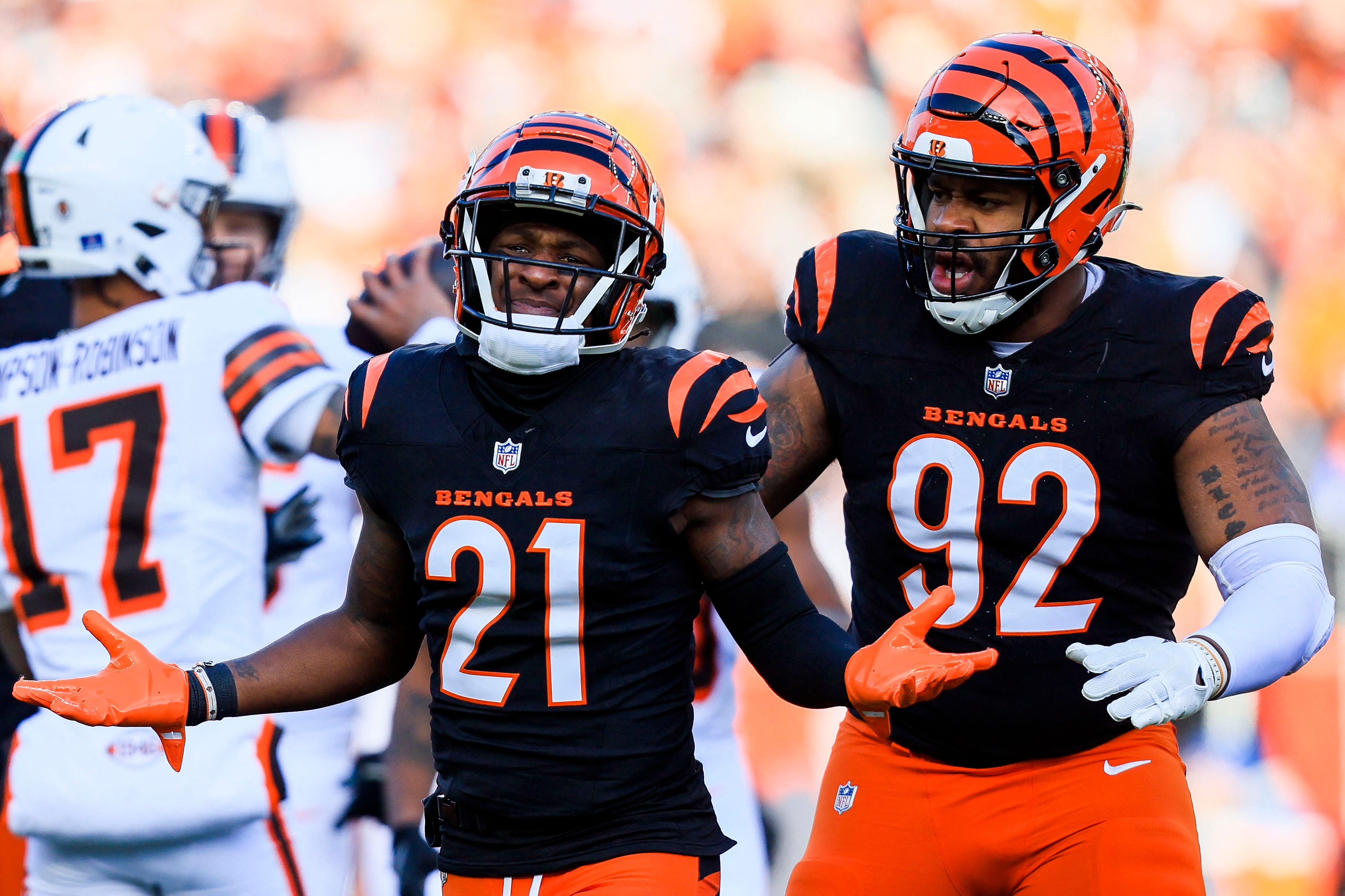 Dec 22, 2024; Cincinnati, Ohio, USA; Cincinnati Bengals cornerback Mike Hilton (21) reacts after sacking Cleveland Browns quarterback Dorian Thompson-Robinson (17) in the first half at Paycor Stadium.