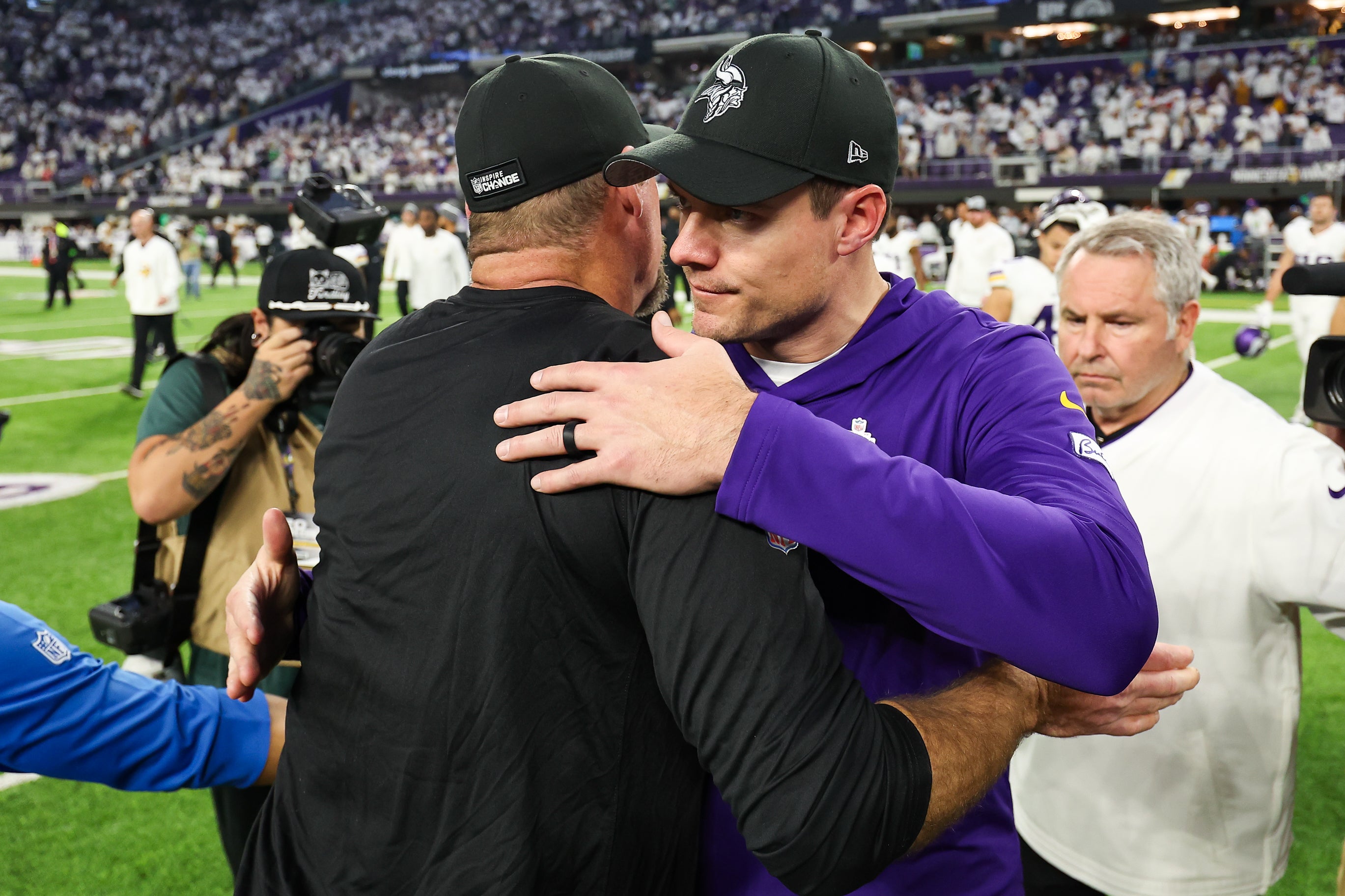 Detroit Lions head coach Dan Campbell and Minnesota Vikings head coach Kevin O'Connell shake hands after the game at U.S. Bank Stadium. With the win the Detroit Lions clinched the NFC North.