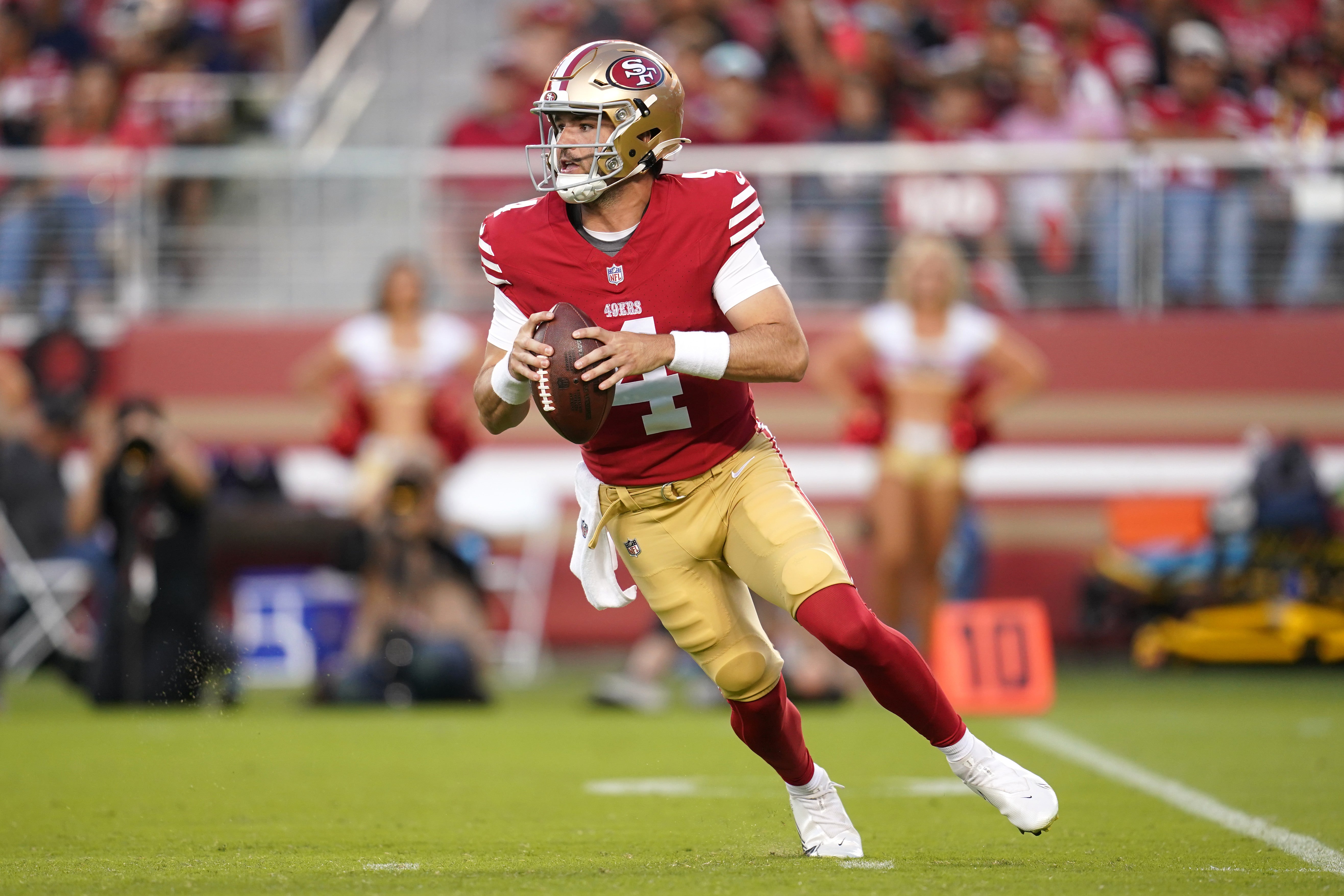 San Francisco 49ers quarterback Tanner Mordecai (4) looks to throw a pass against the New Orleans Saints in the fourth quarter at Levi's Stadium. Mandatory Credit: