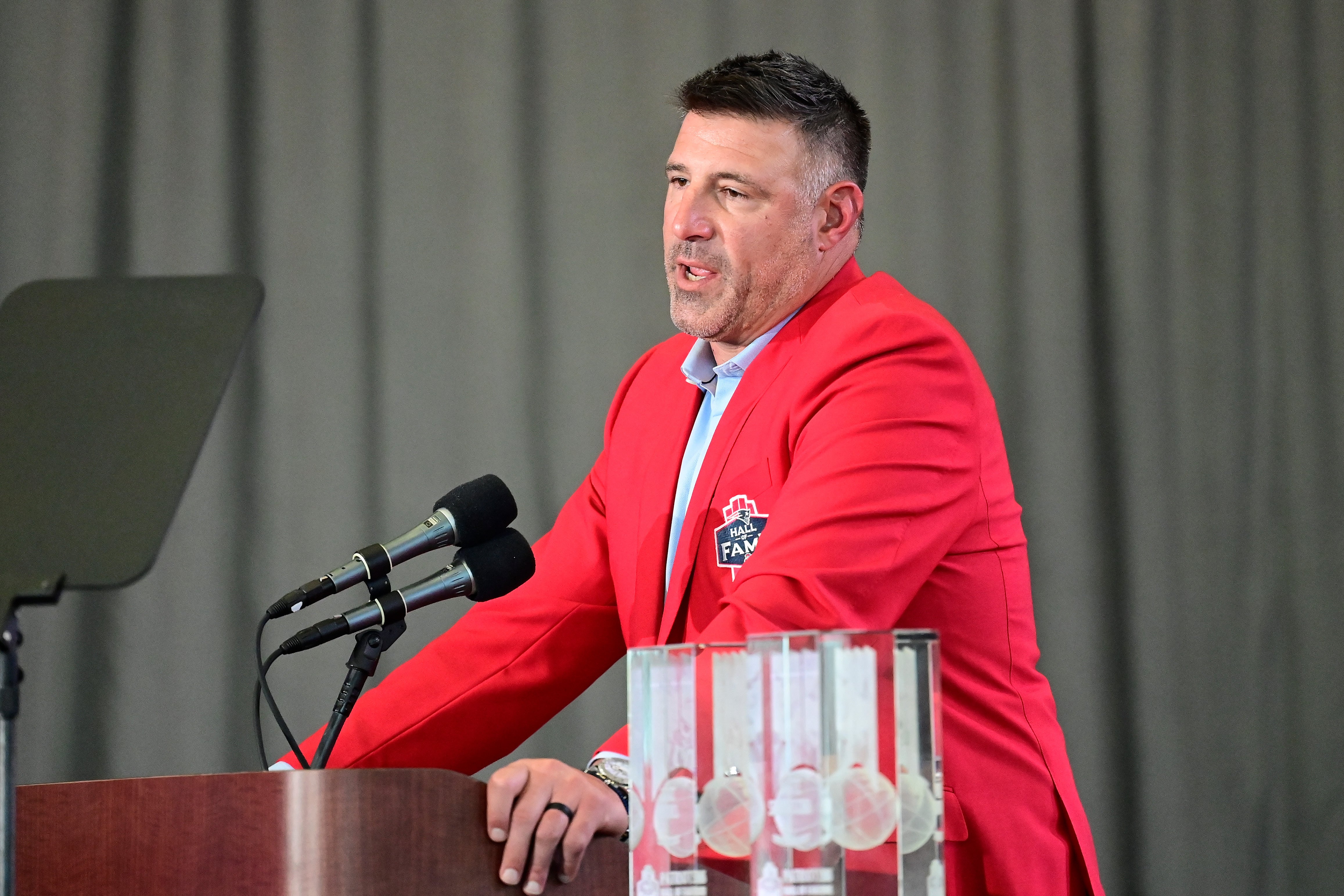 New England Patriots former linebacker and current Tennessee Titans head coach Mike Vrabel makes a speech at his 2023 Patriots Hall of Fame induction in the Cross Insurance Pavilion at Gillette Stadium.