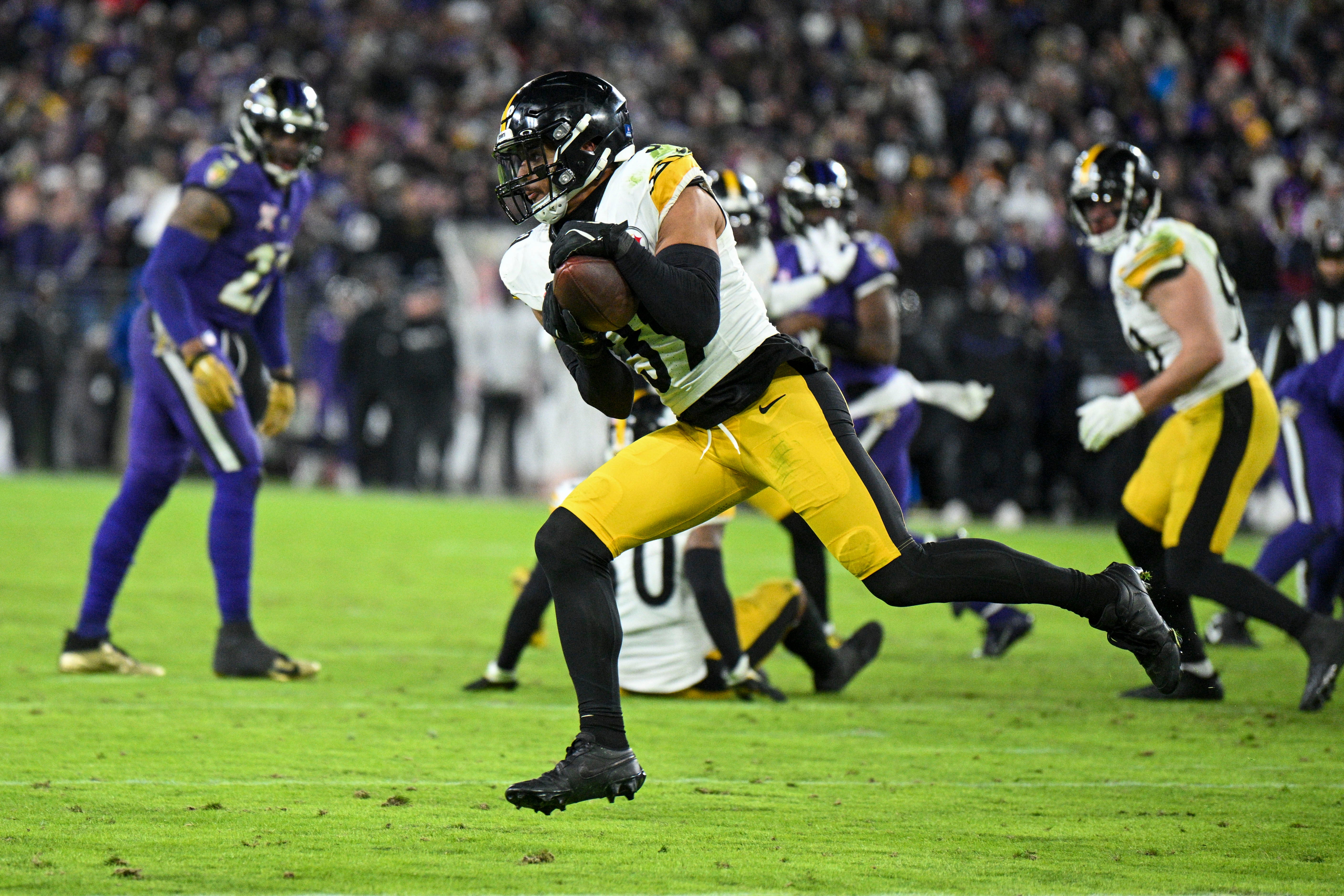 Dec 21, 2024; Baltimore, Maryland, USA; Pittsburgh Steelers safety Minkah Fitzpatrick (39) intercepts a pass during the second half against the Baltimore Ravens at M&T Bank Stadium. Mandatory Credit: Tommy Gilligan-Imagn Images