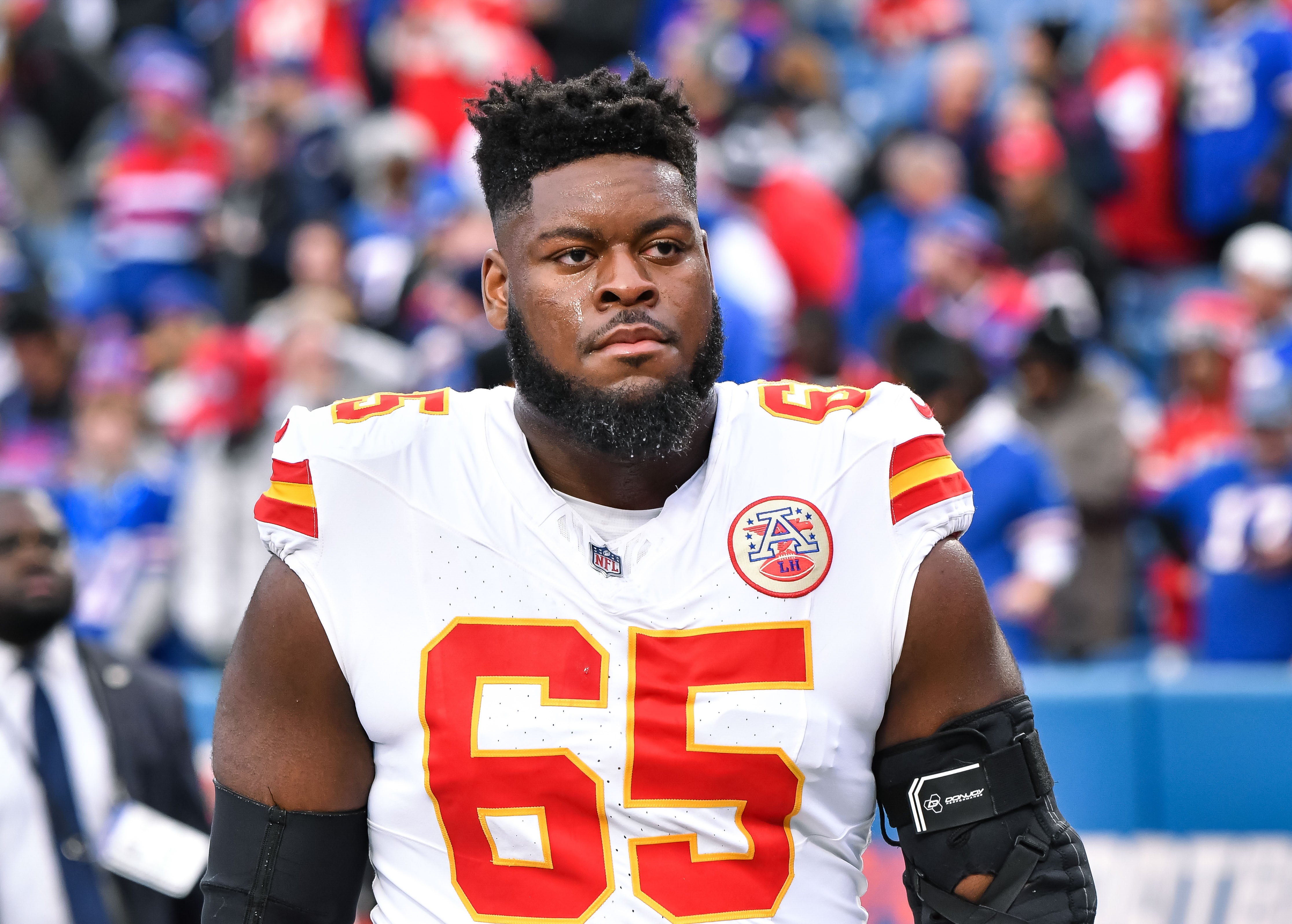 Nov 17, 2024; Orchard Park, New York, USA; Kansas City Chiefs guard Trey Smith (65) leaves the field after warm ups before a game against the Buffalo Bills at Highmark Stadium. M