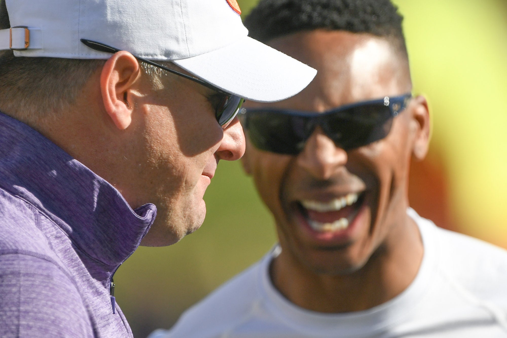 Clemson Tigers former players Jeff Scott (left) and Chansi Stuckey share a laugh before a game against the Notre Dame Fighting Irish at Memorial Stadium.