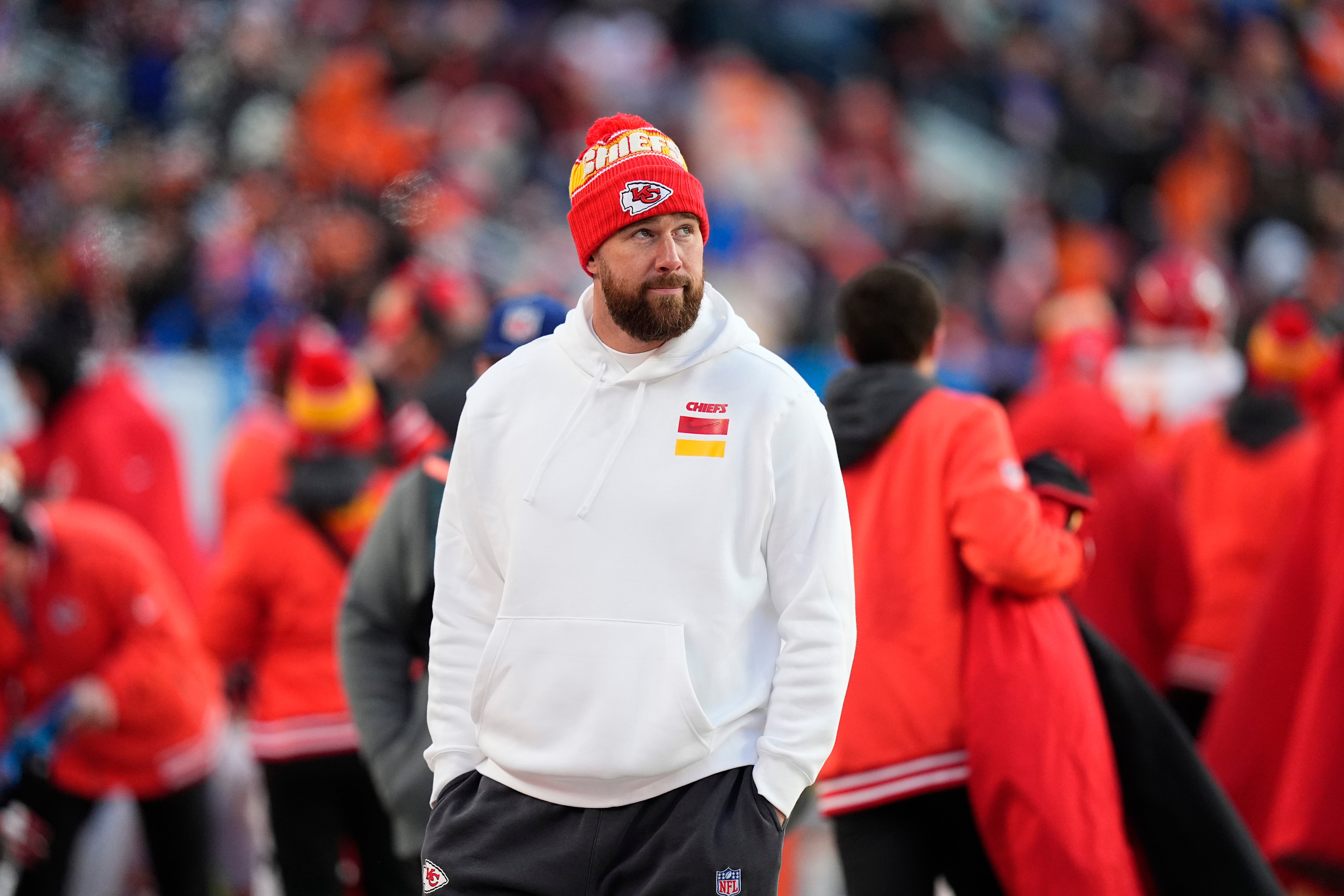 Jan 5, 2025; Denver, Colorado, USA; Kansas City Chiefs tight end Travis Kelce (87) walks the sidelines in the second half against the Denver Broncos at Empower Field at Mile High.