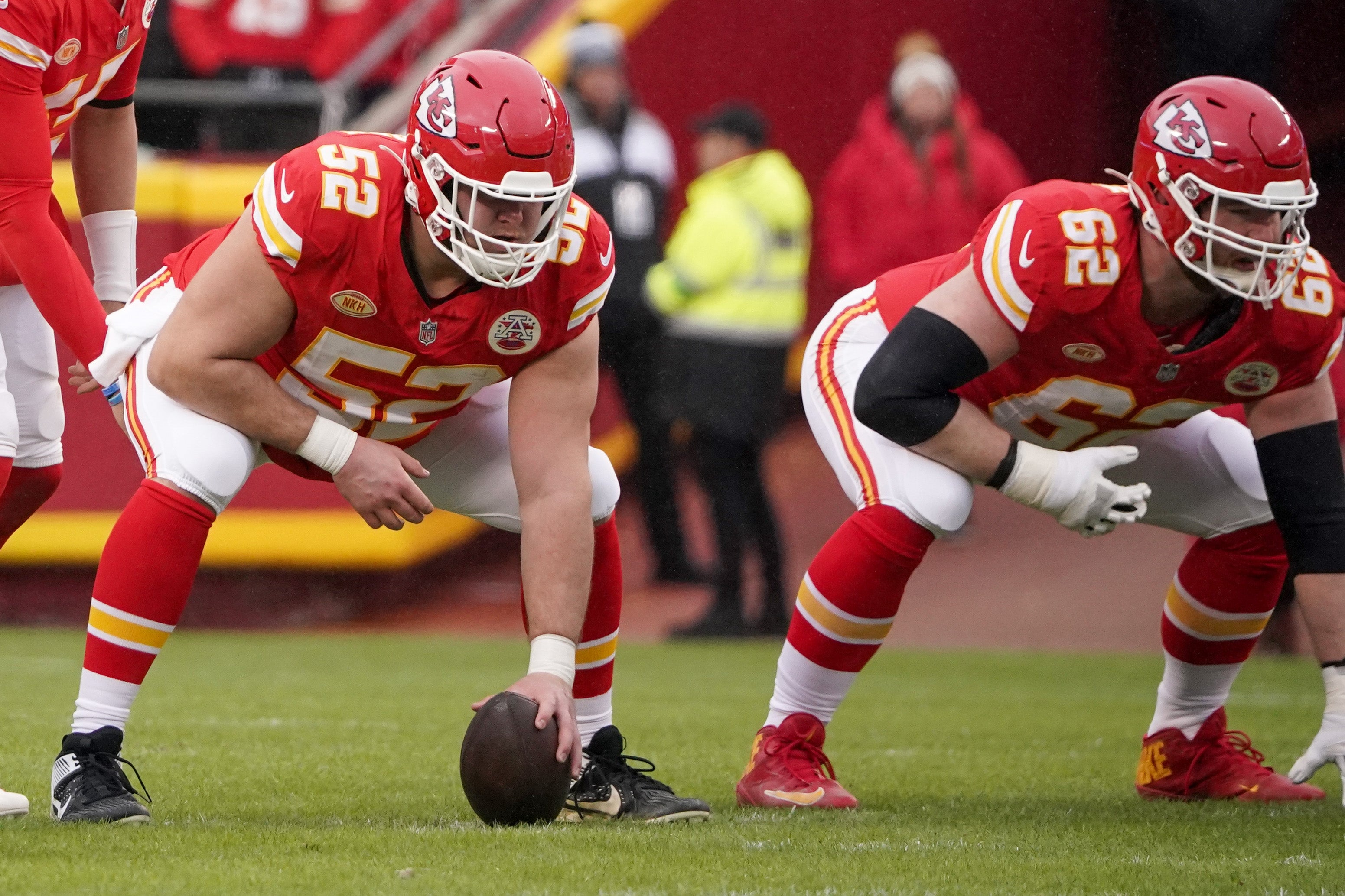 Chiefs center Creed Humphrey (52) and guard Joe Thuney (62) at the line of scrimmage against the Raiders.