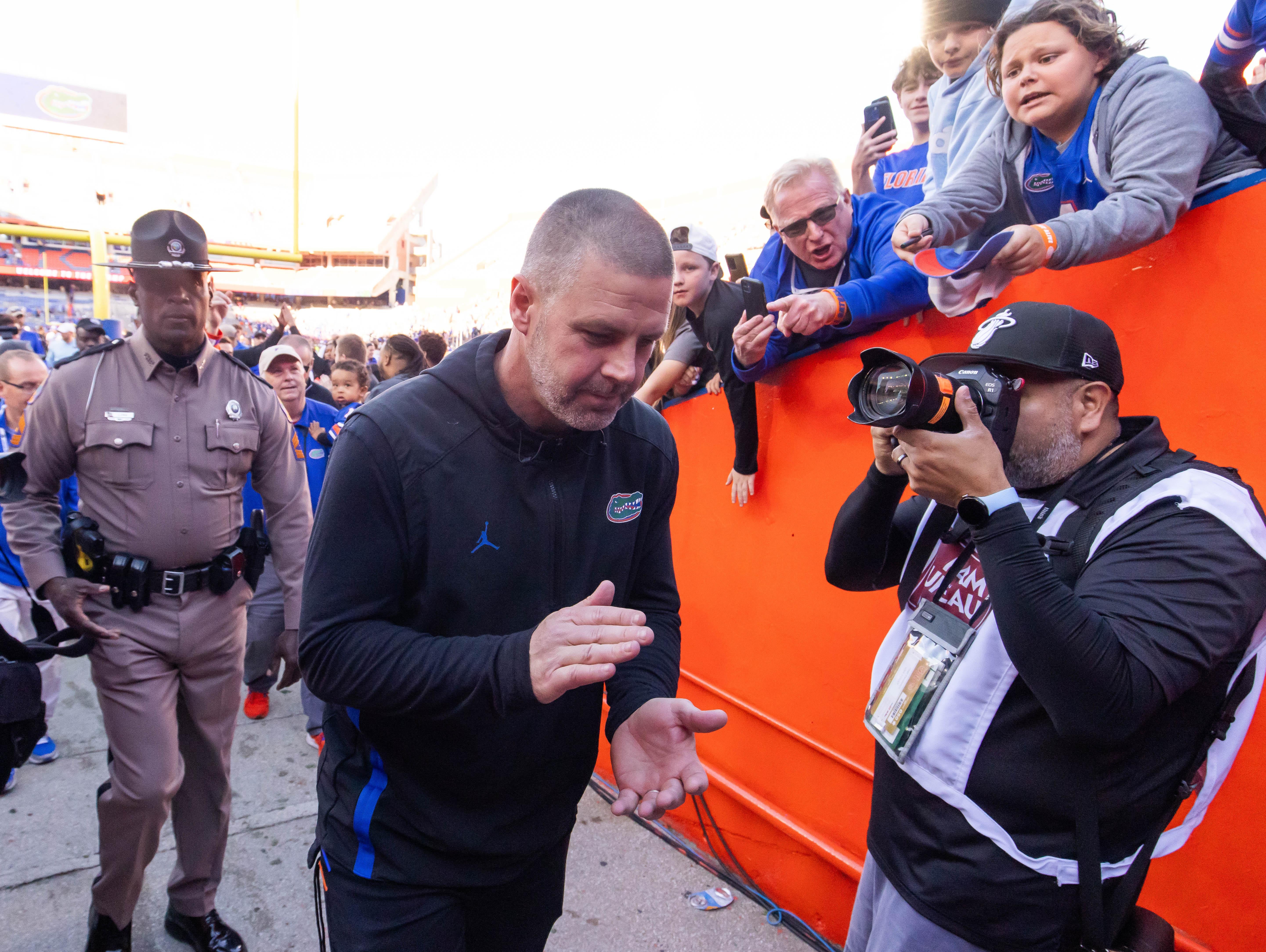 Florida Gators head coach Billy Napier claps his hands at Ben Hill Griffin Stadium in Gainesville, FL on Saturday, November 23, 2024 after the Gators defeated the Rebels 24-17