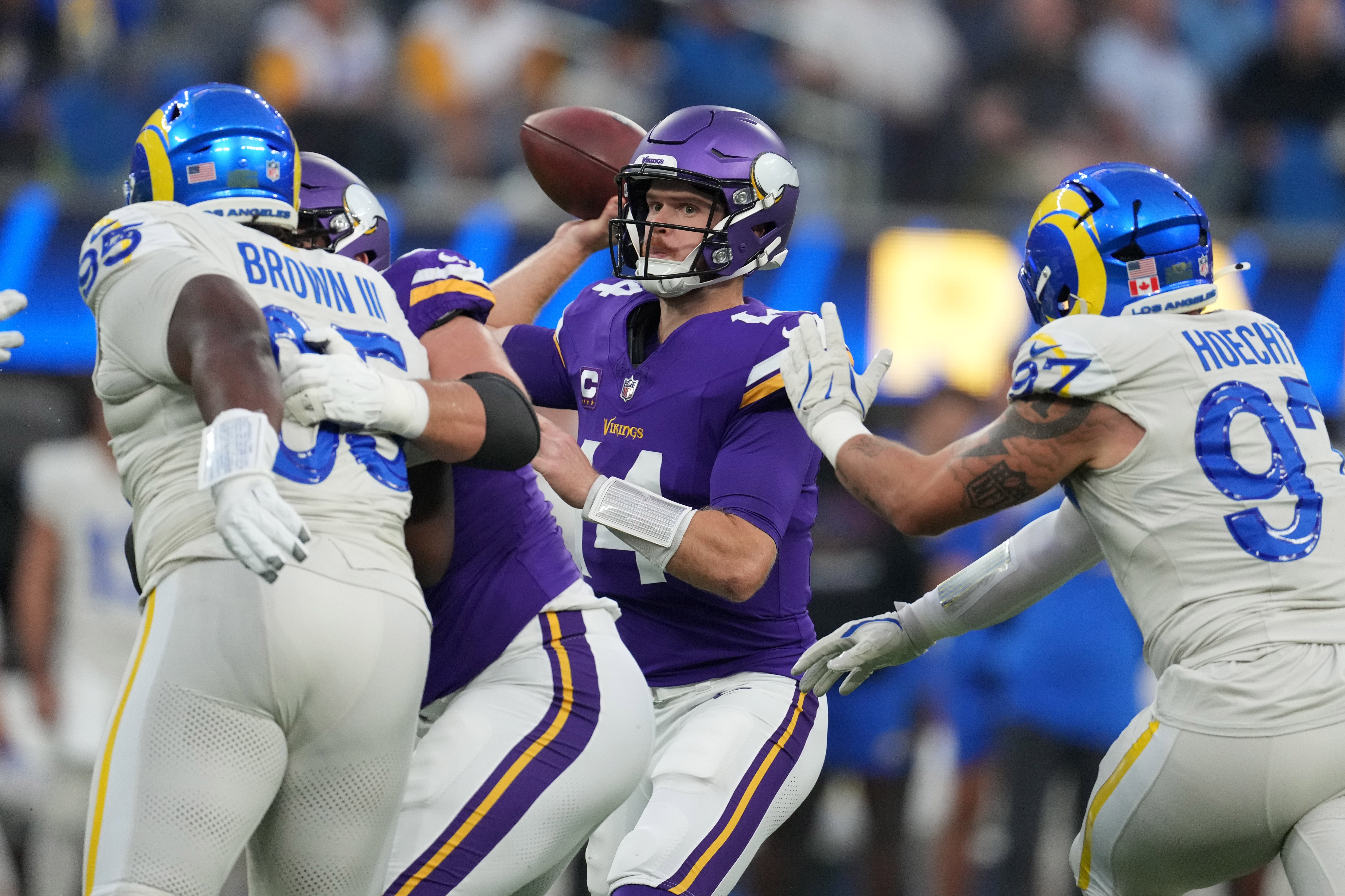 Oct 24, 2024; Inglewood, California, USA; Minnesota Vikings quarterback Sam Darnold (14) throws the ball against the Los Angeles Rams in the first half at SoFi Stadium.