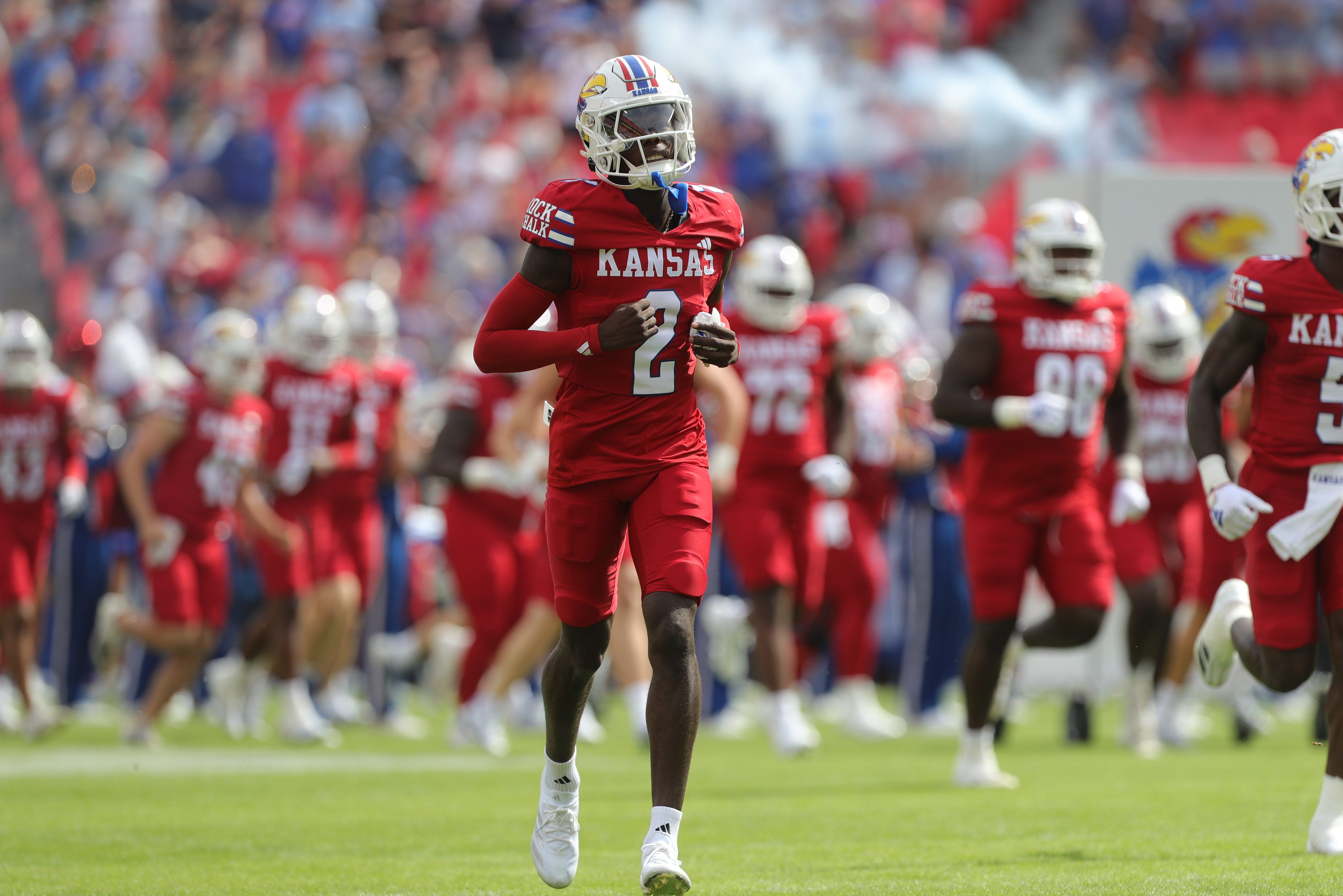 Kansas Jayhawks cornerback Cobee Bryant (2) runs on to GEHA Field at Arrowhead Stadium to take on TCU Saturday, September 28, 2024.