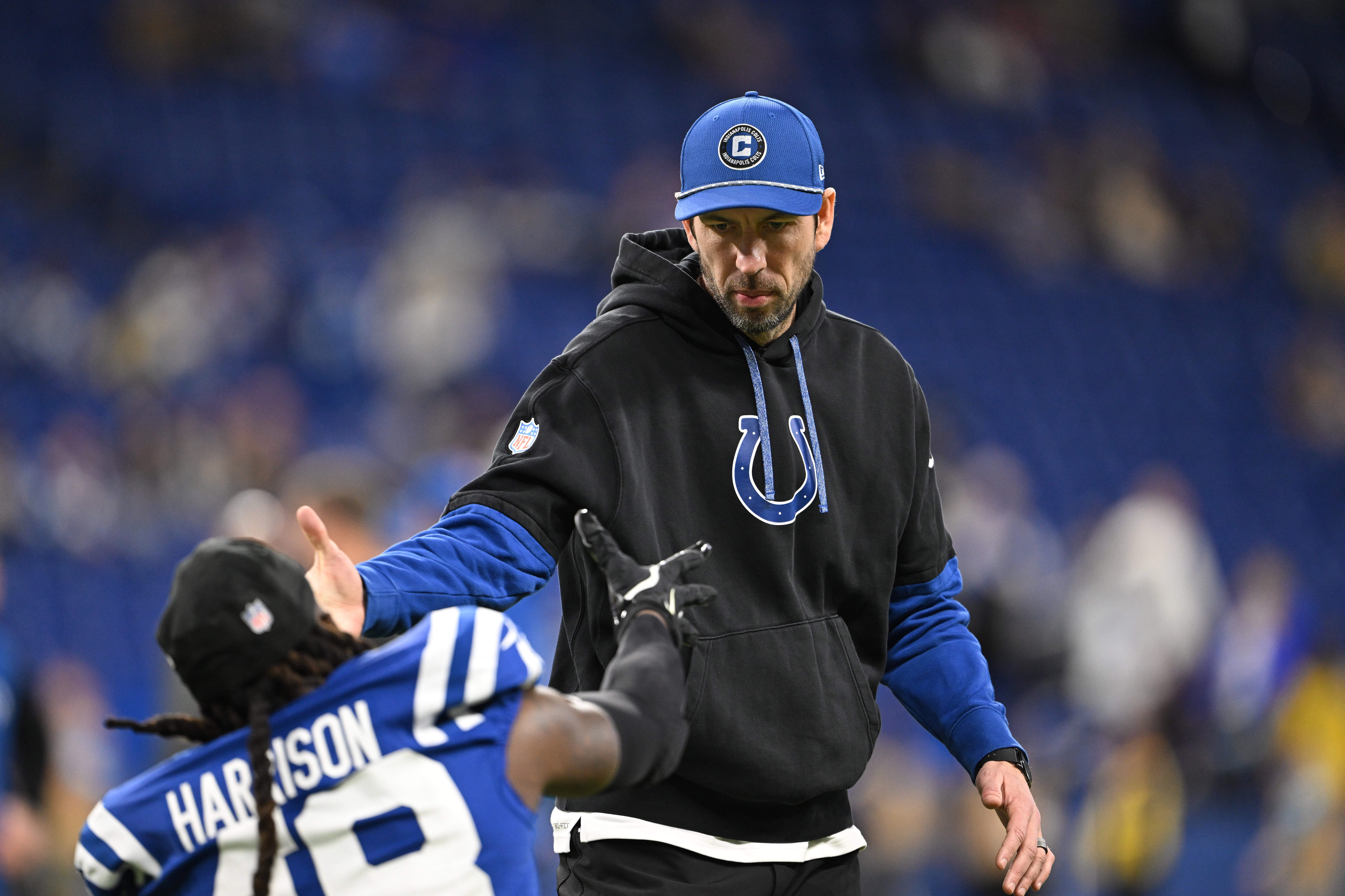 Jan 5, 2025; Indianapolis, Indiana, USA; Indianapolis Colts head coach Shane Steichen high fives Indianapolis Colts safety Ronnie Harrison Jr. (48) before the game against the Jacksonville Jaguars at Lucas Oil Stadium.