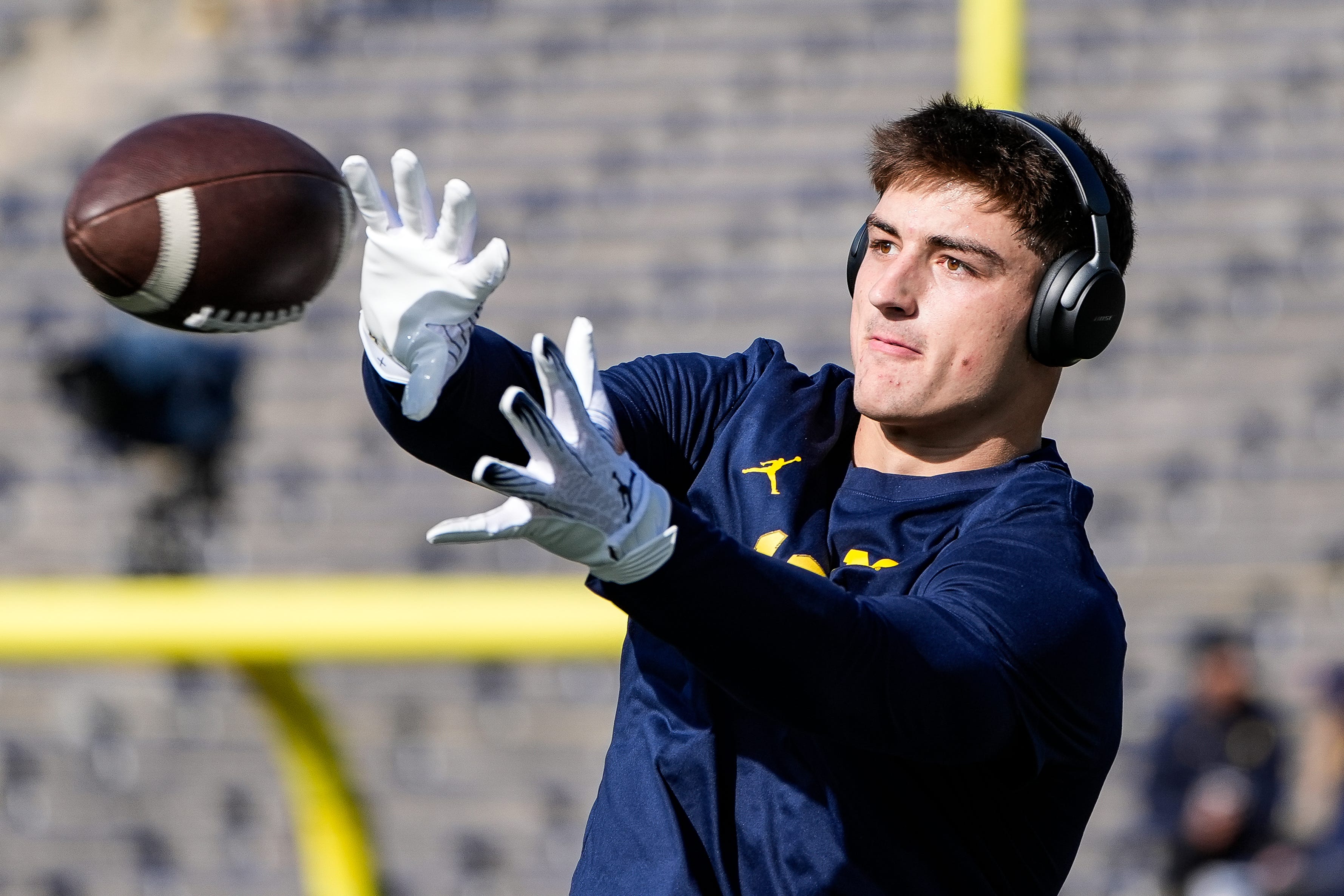 Michigan tight end Colston Loveland (18) warms up before the Oregon game at Michigan Stadium in Ann Arbor on Saturday, Nov. 2, 2024.  