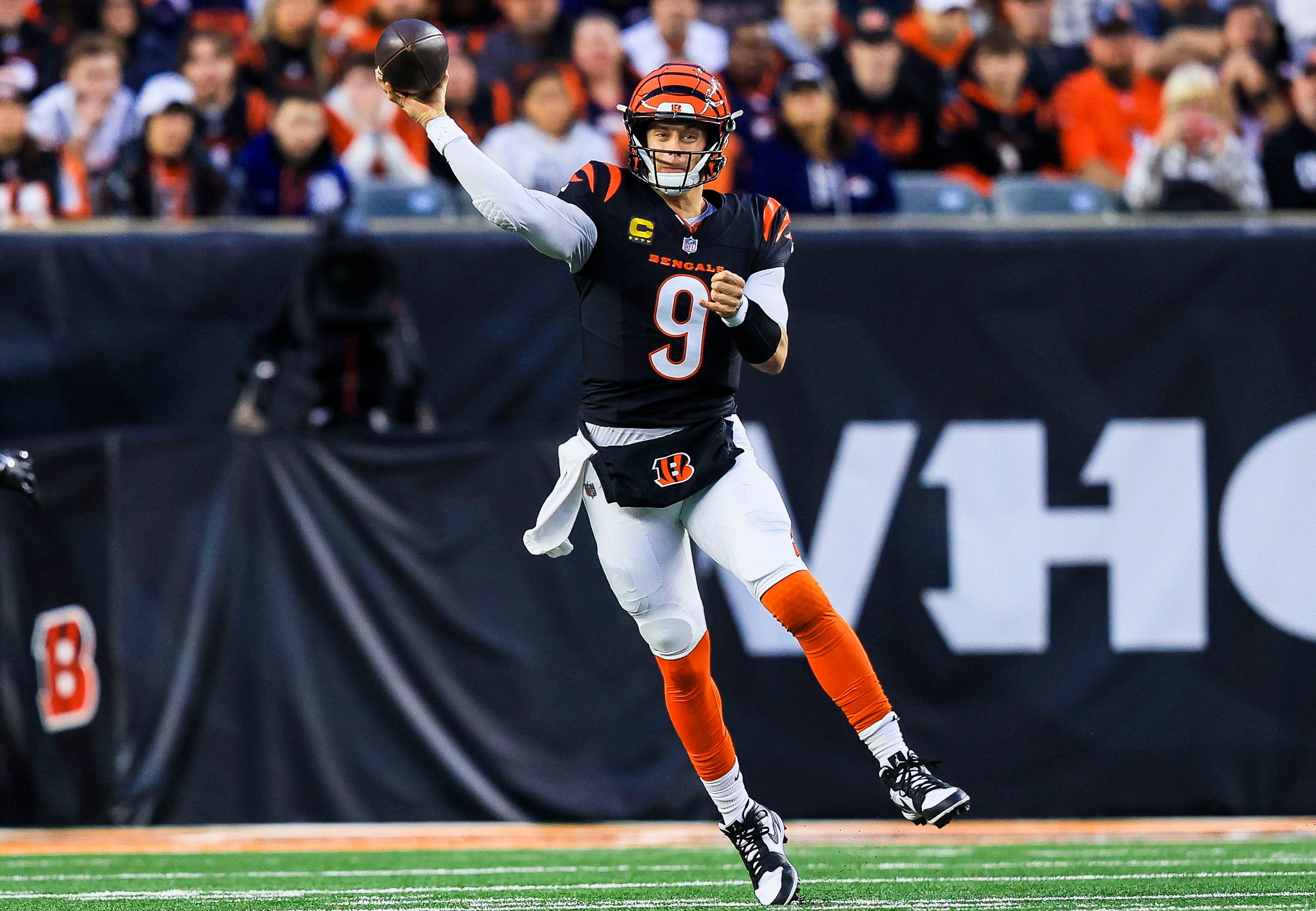 Dec 28, 2024; Cincinnati, Ohio, USA; Cincinnati Bengals quarterback Joe Burrow (9) throws a pass against the Denver Broncos in the first half at Paycor Stadium.