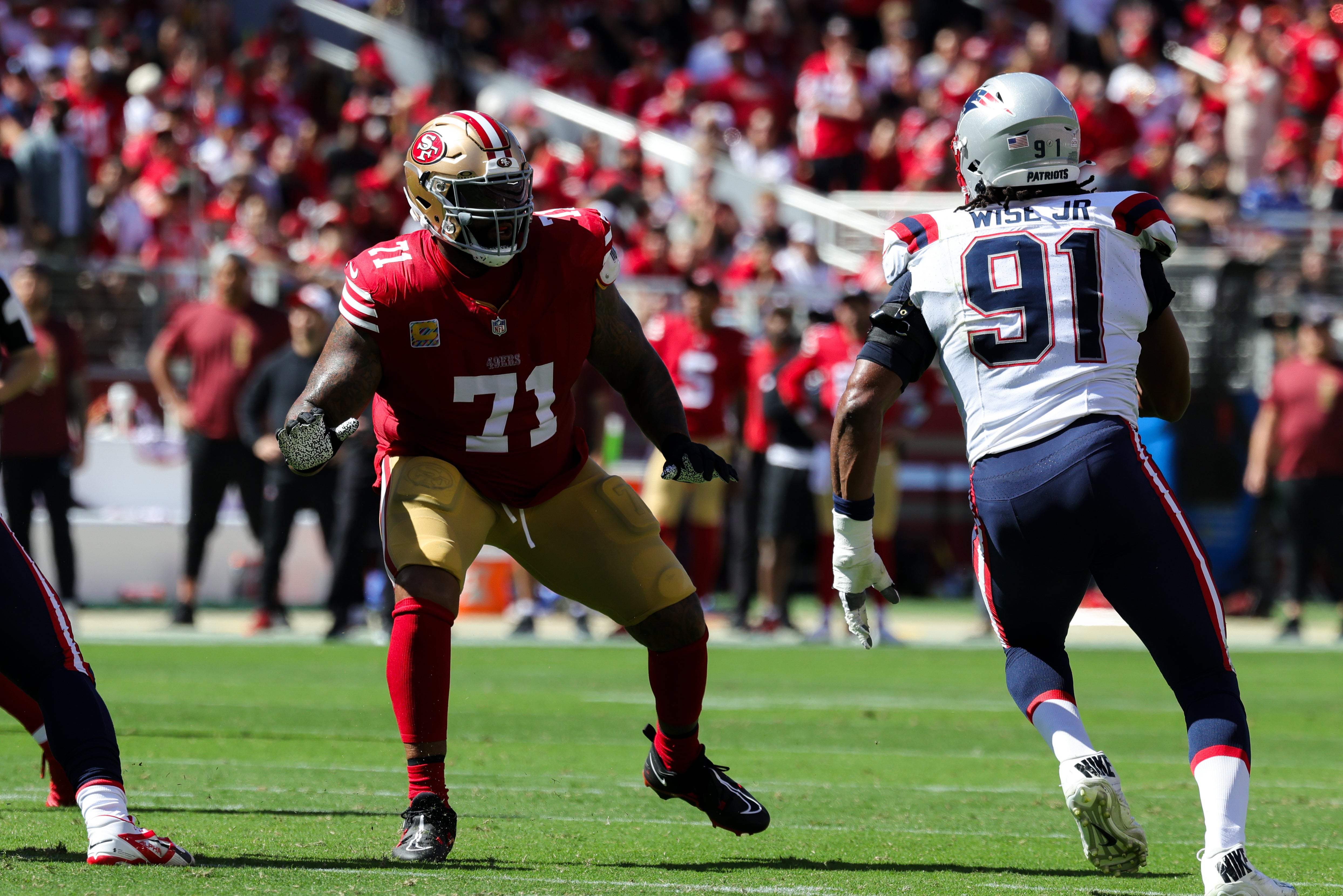 San Francisco 49ers offensive tackle Trent Williams (71) blocks against New England Patriots defensive end Deatrich Wise Jr. (91) during the second quarter at Levi's Stadium.