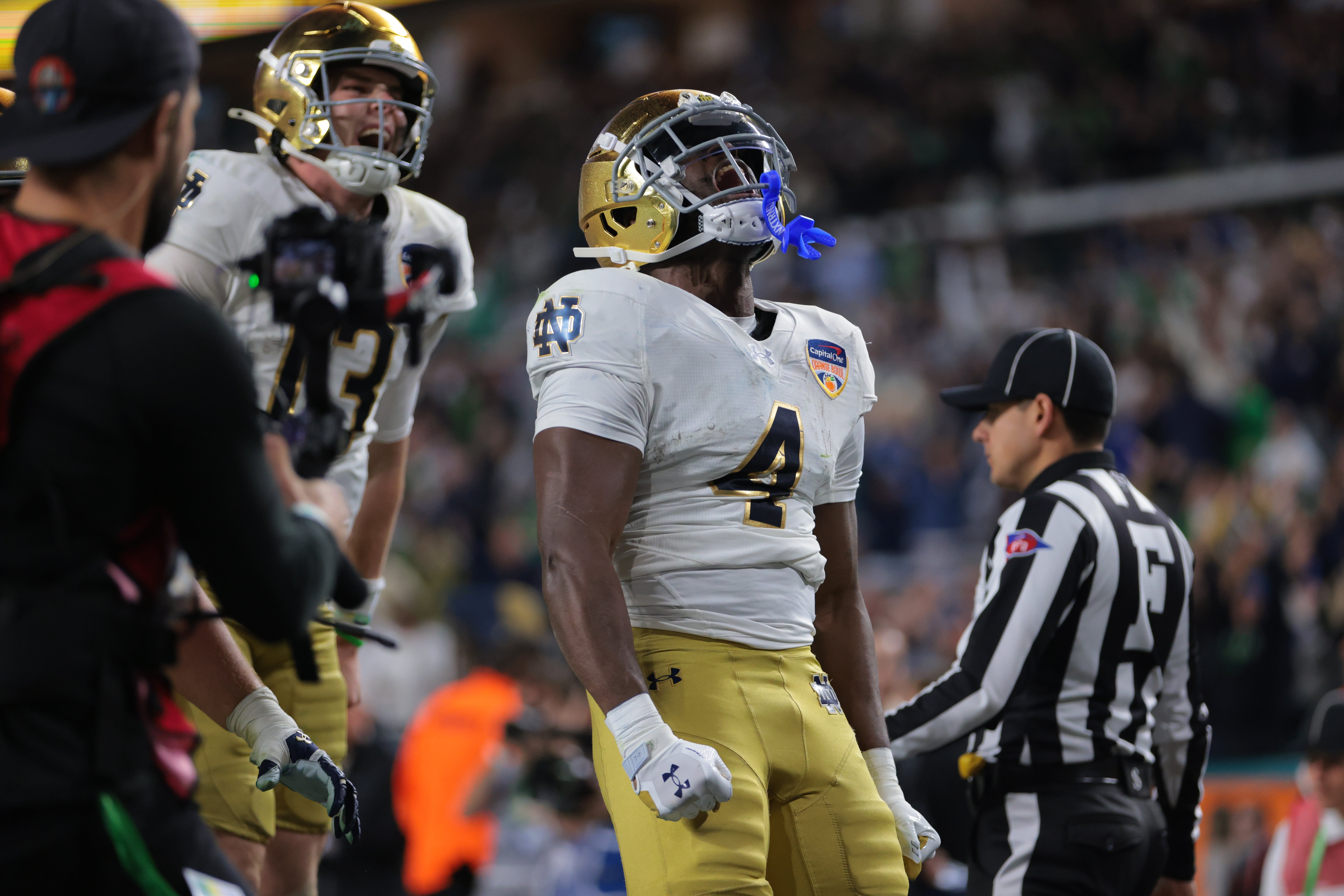 Notre Dame Fighting Irish running back Jeremiyah Love (4) celebrates a touch down in the second half against the Penn State Nittany Lions at Hard Rock Stadium.