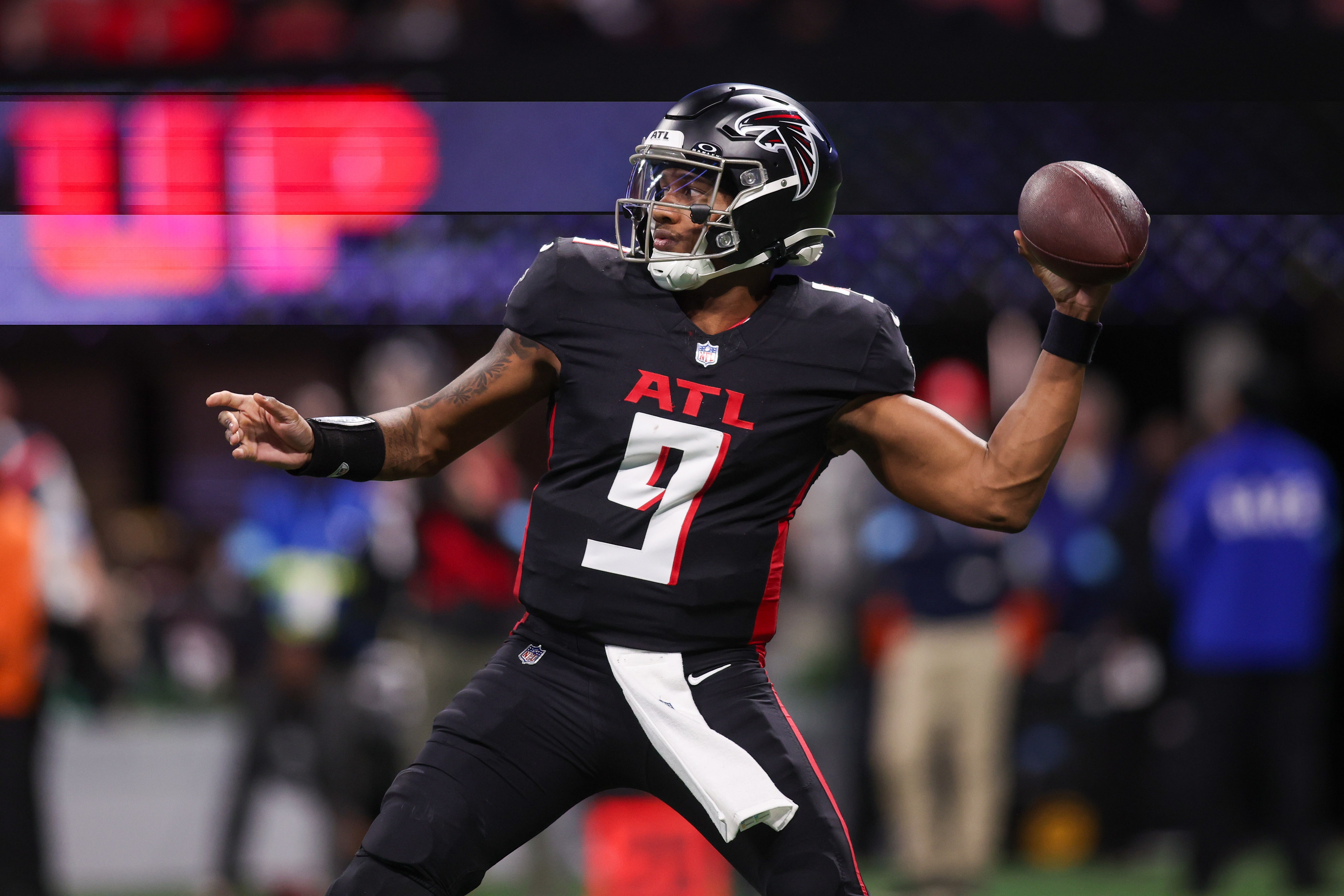 Jan 5, 2025; Atlanta, Georgia, USA; Atlanta Falcons quarterback Michael Penix Jr. (9) throws a pass against the Carolina Panthers in the third quarter at Mercedes-Benz Stadium.