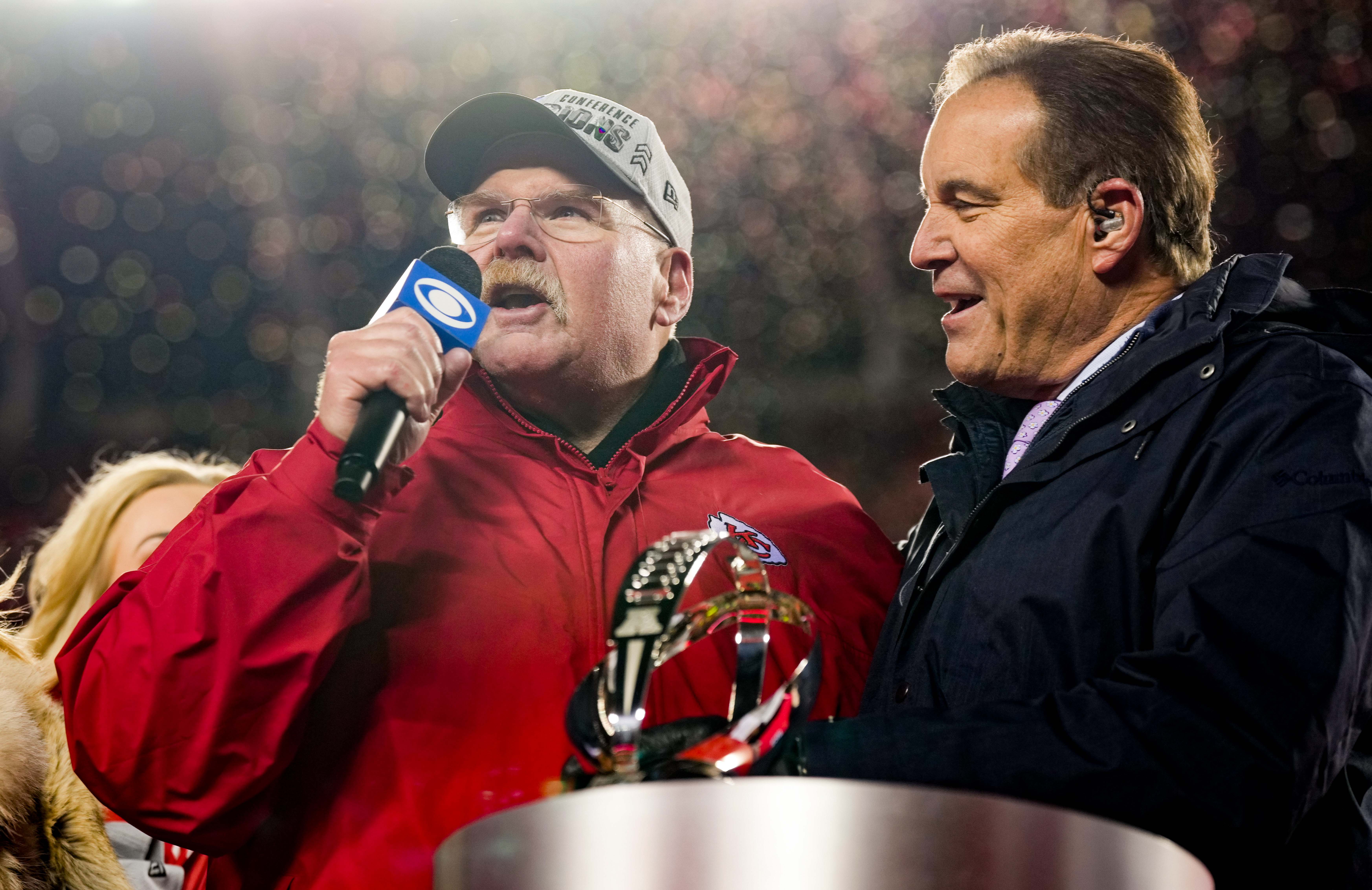 Chiefs head coach Andy Reid addresses the crowd as CBS broadcaster Jim Nantz looks on after defeating the Bengals in the AFC Championship game.