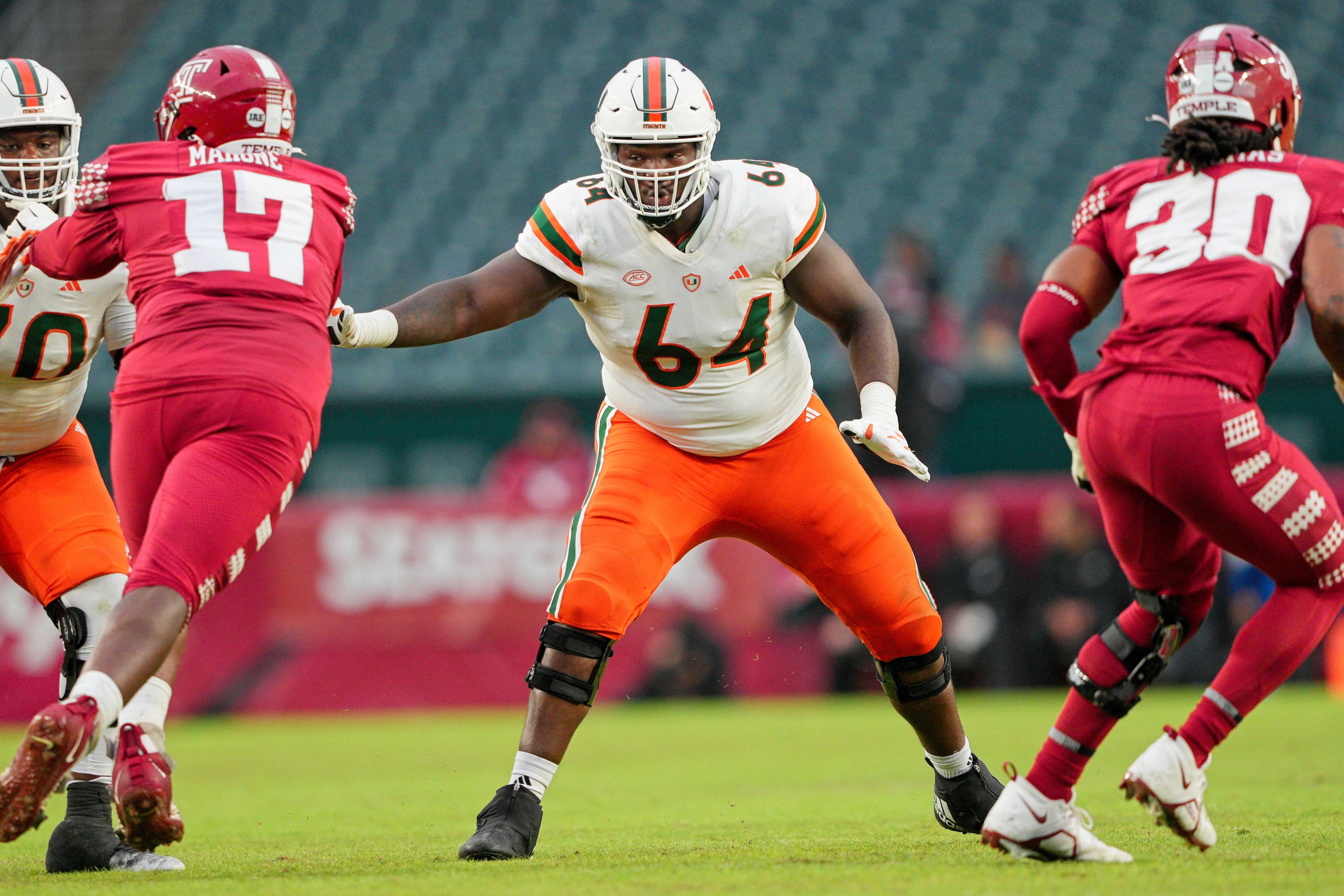 Sep 23, 2023; Philadelphia, Pennsylvania, USA; Miami Hurricanes offensive lineman Jalen Rivers (64) sets up to block in the second half against the Temple Owls at Lincoln Financial Field.
