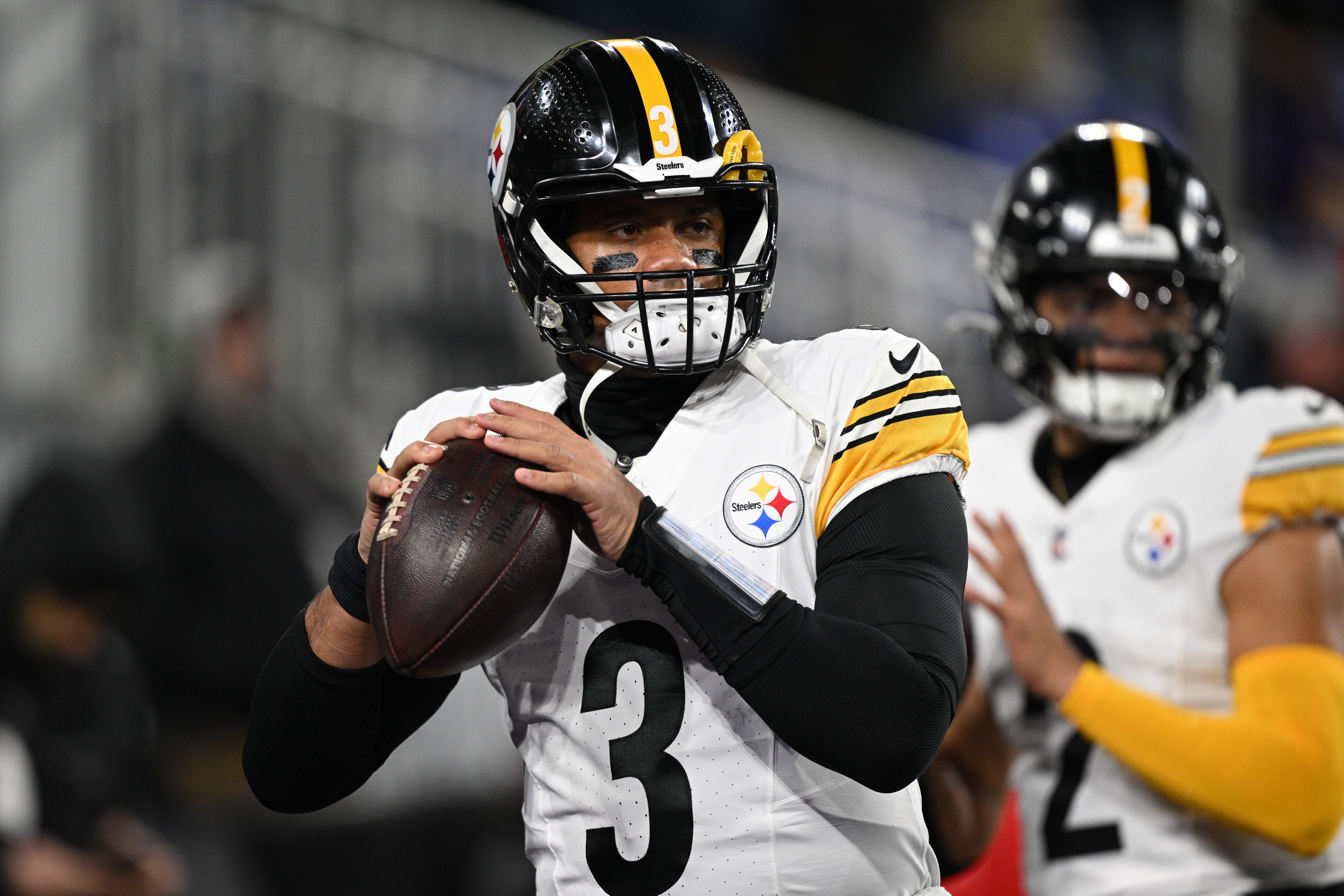 Jan 11, 2025; Baltimore, Maryland, USA; Pittsburgh Steelers quarterback Russell Wilson (3) warms up before an AFC wild card game against the Baltimore Ravens at M&T Bank Stadium.