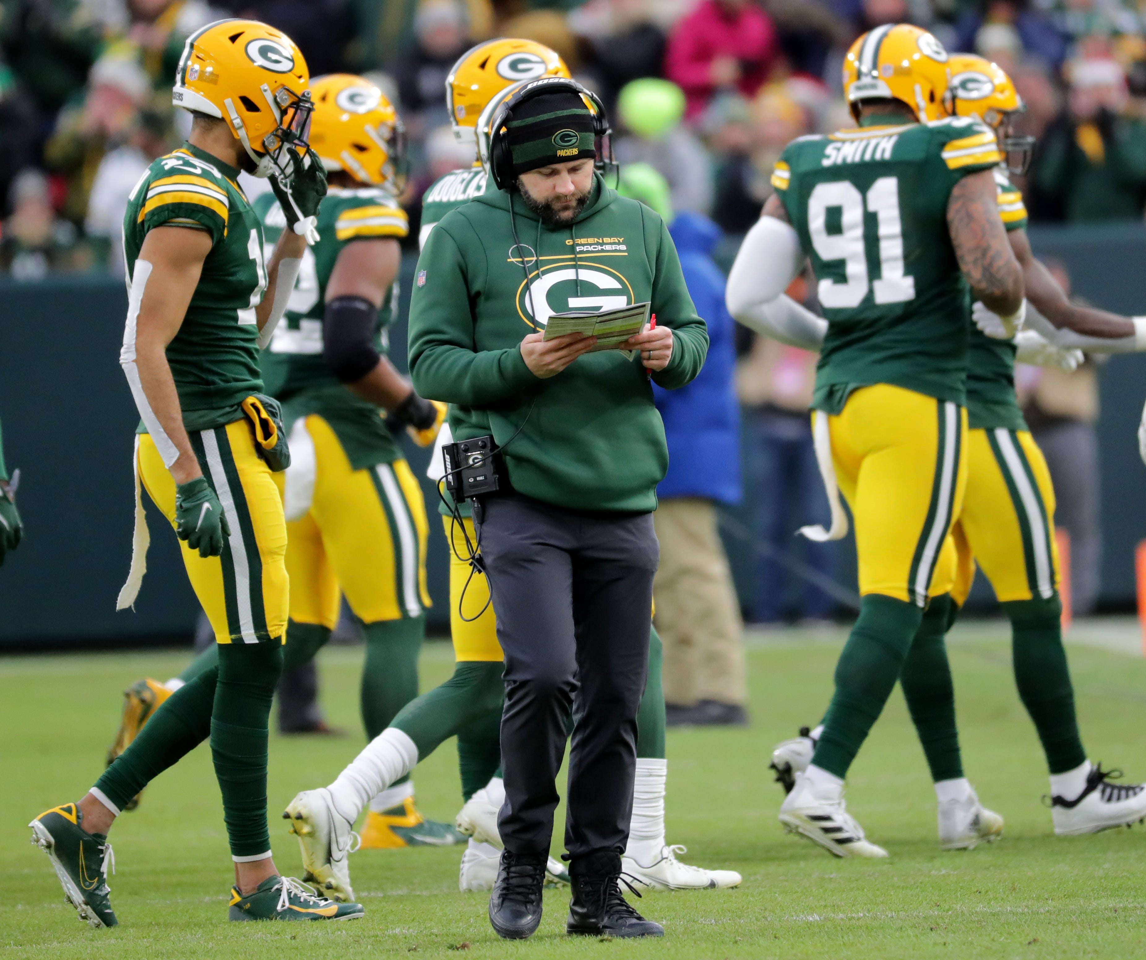 Green Bay Packers wide receivers coach Jason Vrable is shown during the second quarter of their game Saturday, December 25, 2021 at Lambeau Field in Green Bay, Wis. The Green Bay Packers beat the Cleveland Browns 24-22. Packers26 17