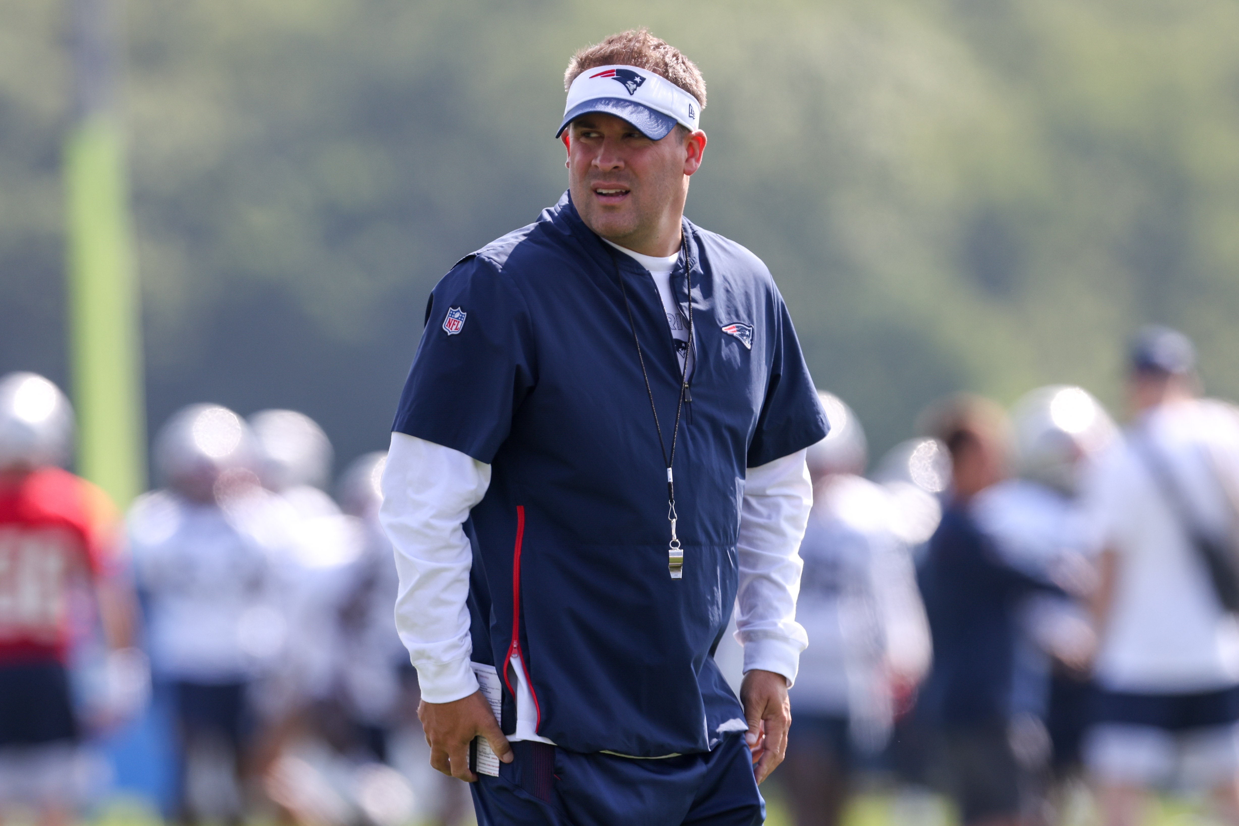 Jul 30, 2021; Foxborough, MA, United States; New England Patriots offensive coordinator Josh McDaniels reacts during training camp at Gillette Stadium.