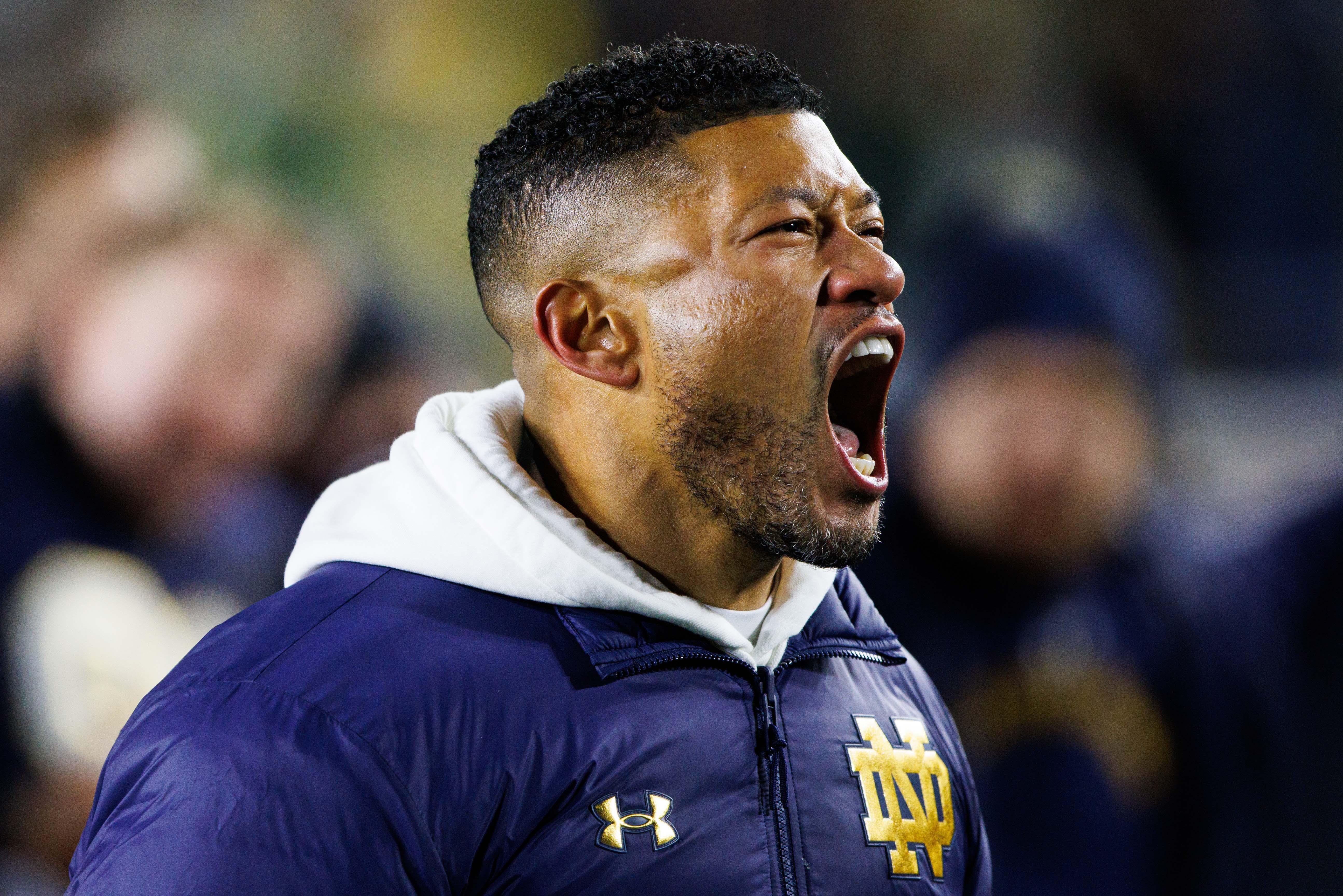 Notre Dame head coach Marcus Freeman celebrates after winning the first round of the College Football Playoff 27-17 against Indiana at Notre Dame Stadium on Friday, Dec. 20, 2024, in South Bend.