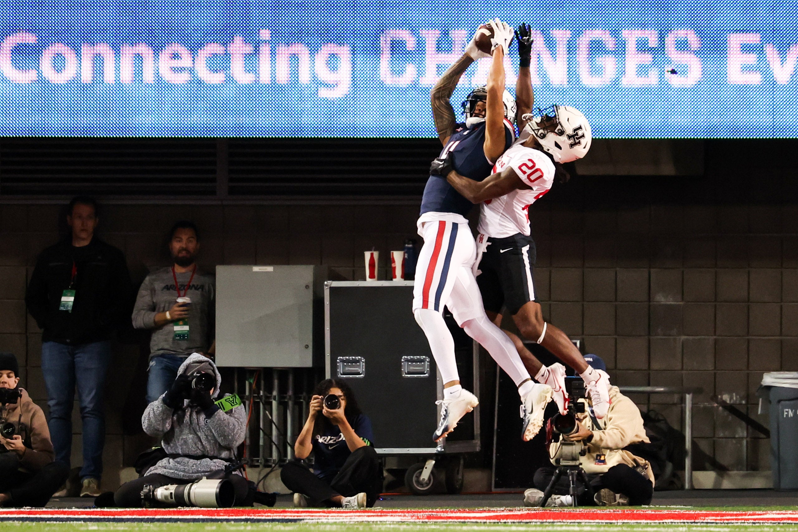Nov 15, 2024; Tucson, Arizona, USA; Arizona Wildcats wide receiver Tetairoa McMillan (4) catches the ball to make a touchdown during the first quarter against the Houston Cougars at Arizona Stadium.
