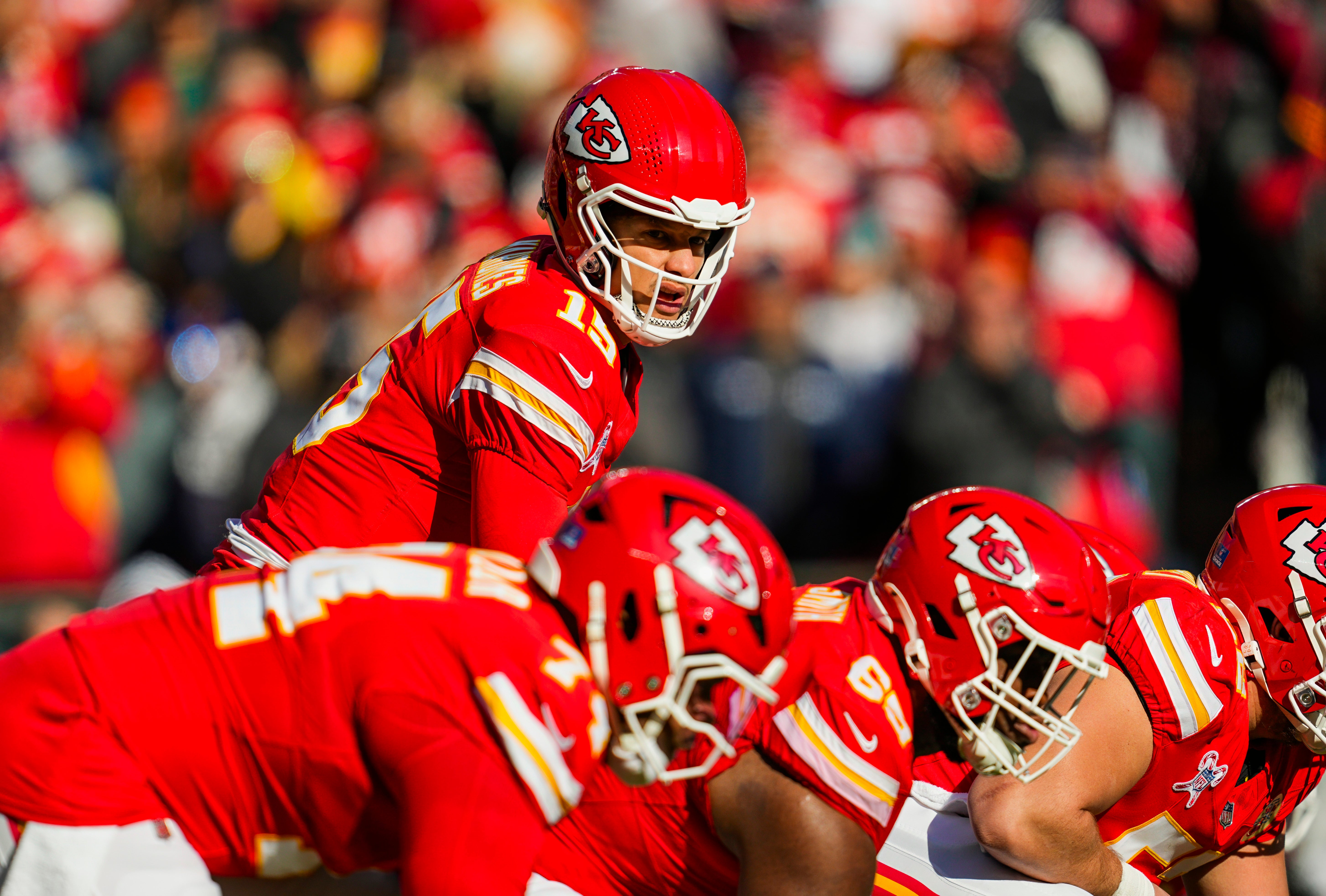 Dec 21, 2024; Kansas City, Missouri, USA; Kansas City Chiefs quarterback Patrick Mahomes (15) gets ready before the snap during the first half against the Houston Texans at GEHA Field at Arrowhead Stadium.