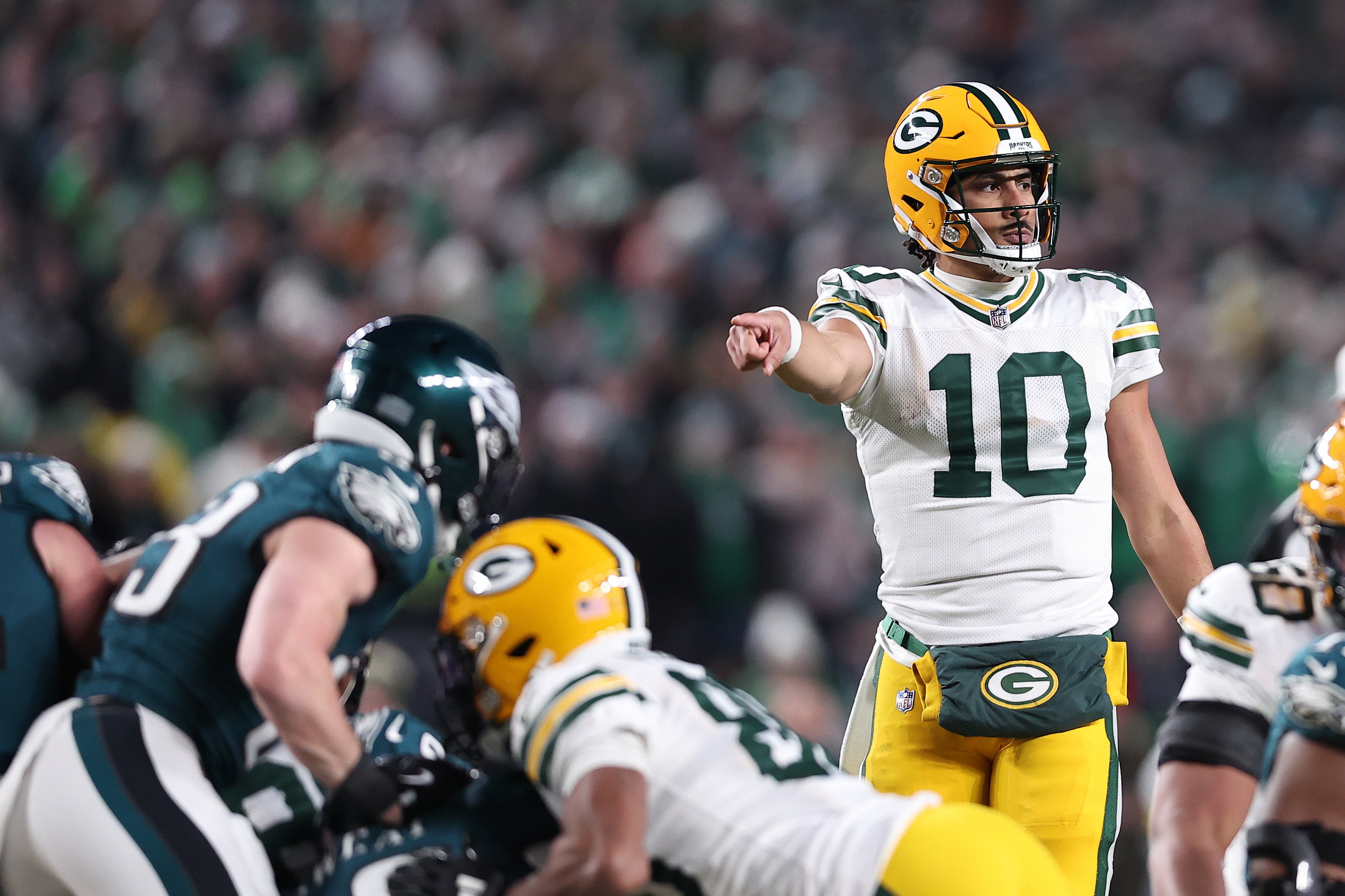 Green Bay Packers quarterback Jordan Love (10) reacts against the Philadelphia Eagles during the first half in an NFC wild card game at Lincoln Financial Field.