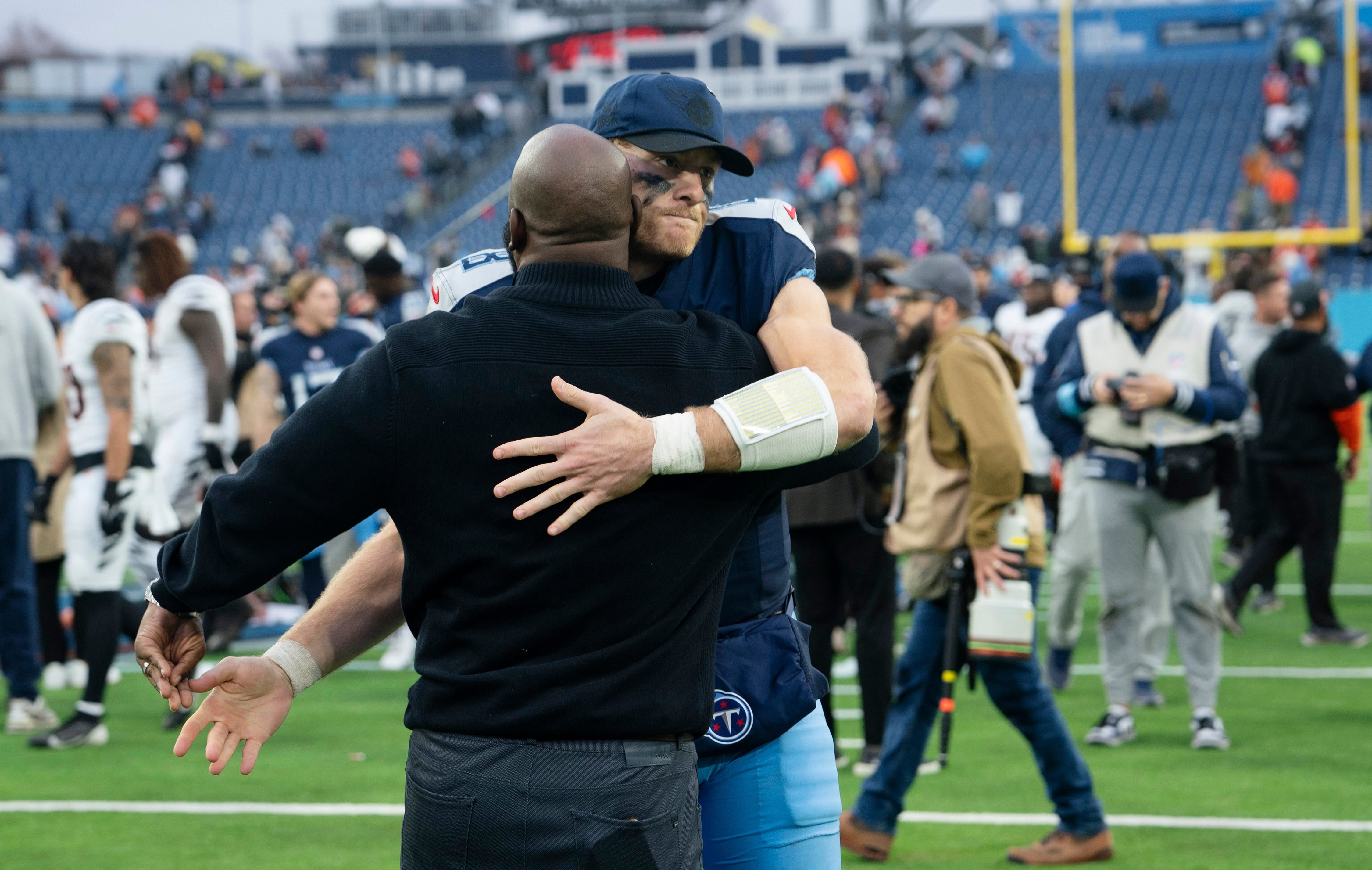 Tennessee Titans quarterback Will Levis (8) receives a hug from the Tennessee Titans General Manager Ran Carthon after their loss to the Cincinnati Bengals at Nissan Stadium in Nashville, Tenn., Sunda... Denny Simmons / The Tennessean-USA TODAY NETWORK via Imagn Images