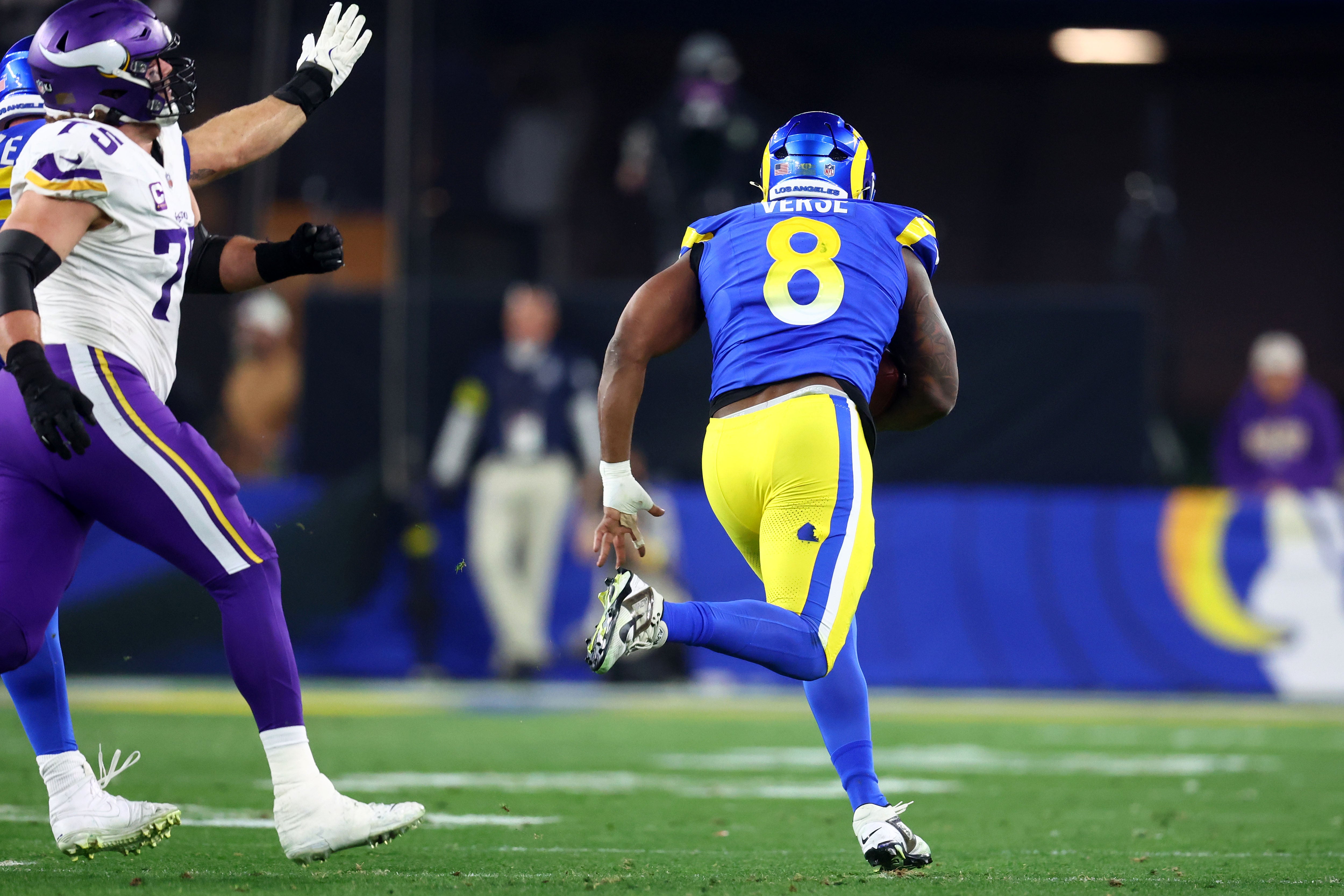 Los Angeles Rams linebacker Jared Verse (8) recovers a fumble against the Minnesota Vikings during the first half in an NFC wild card game at State Farm Stadium.