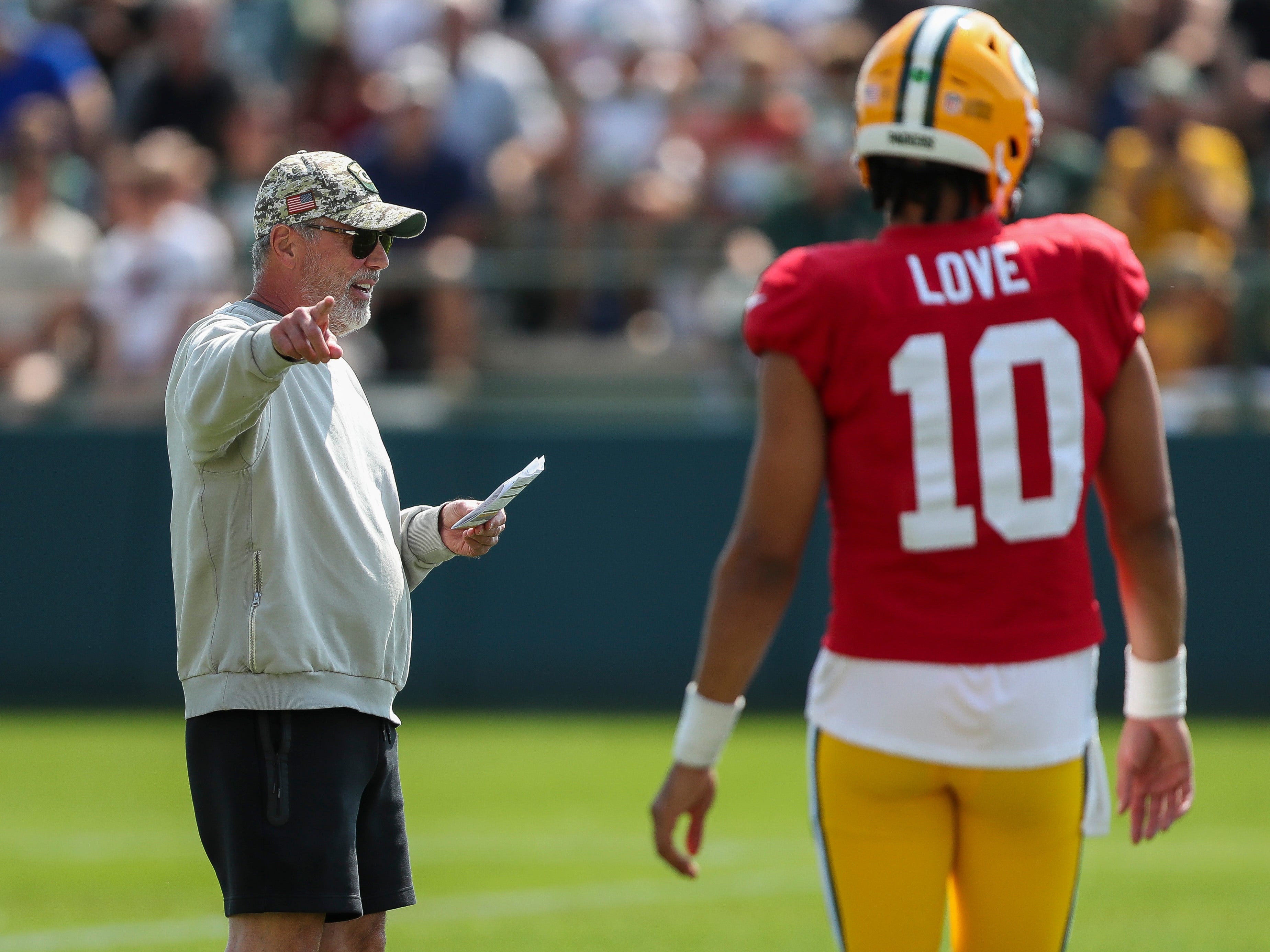 Green Bay Packers quarterbacks coach Tom Clements directs traffic during a drill on Saturday, July 27, 2024, at Ray Nitschke Field in Ashwaubenon, Wis.