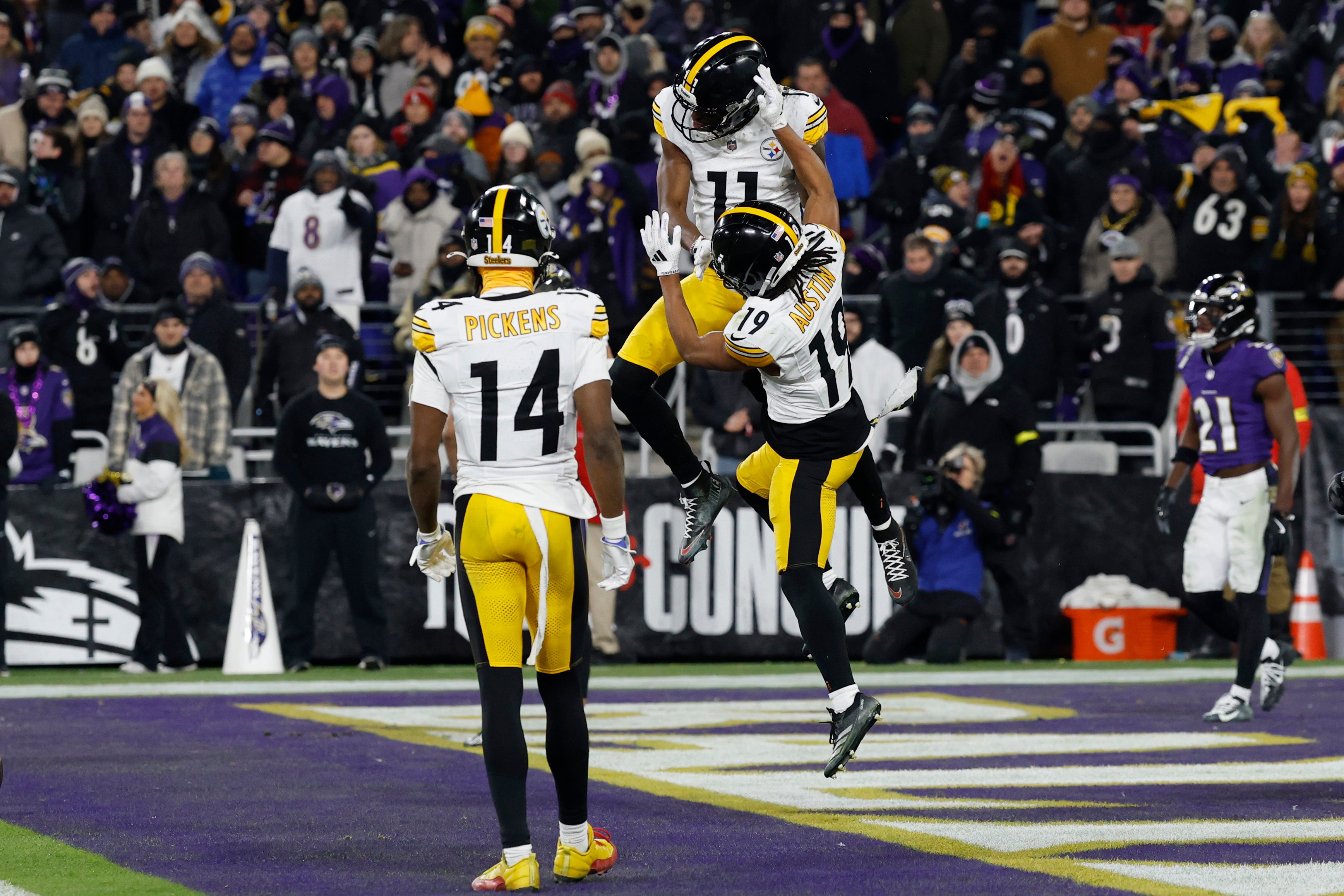Jan 11, 2025; Baltimore, Maryland, USA; Pittsburgh Steelers wide receiver Van Jefferson (11) celebrates with wide receiver Calvin Austin III (19) after a touchdown in the third quarter against the Baltimore Ravens in an AFC wild card game at M&T Bank Stadium.