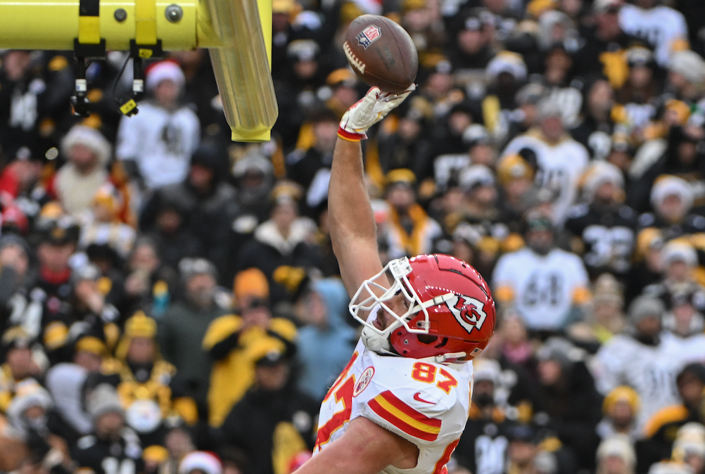 Dec 25, 2024; Pittsburgh, Pennsylvania, USA; Kansas City Chiefs tight end Travis Kelce (87) celebrates a touchdown against the Pittsburgh Steelers during the second half at Acrisure Stadium.