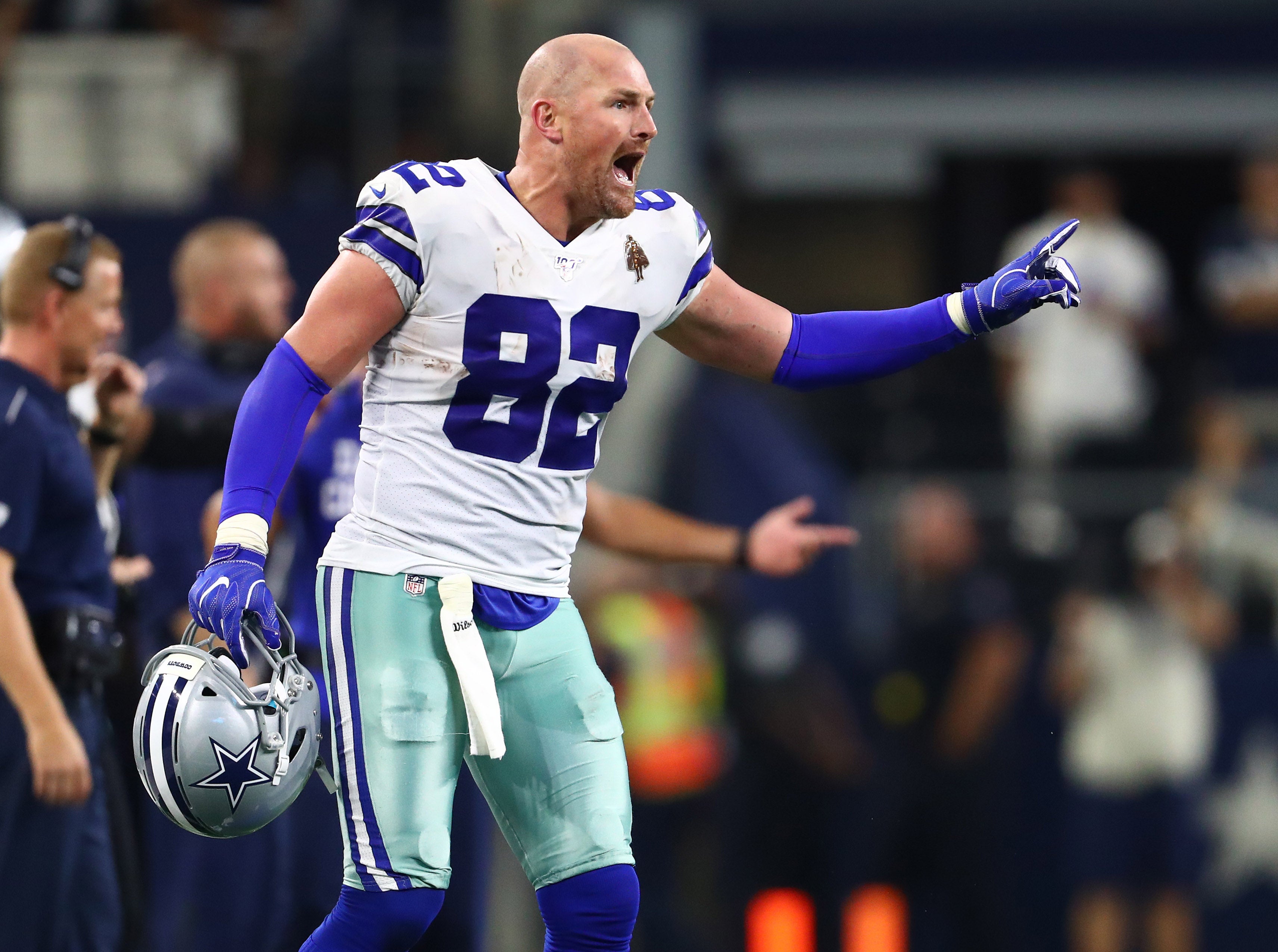 Dallas Cowboys tight end Jason Witten (82) yells from the sidelines during the fourth quarter against the Green Bay Packers at AT&T Stadium.