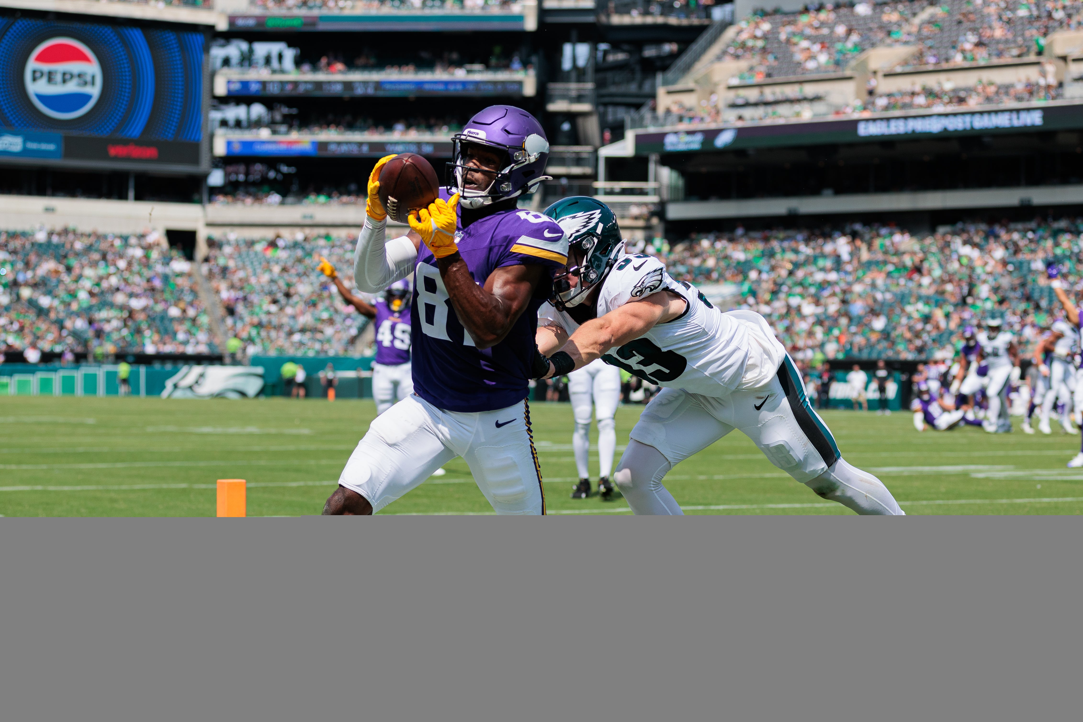 Aug 24, 2024; Philadelphia, Pennsylvania, USA; Philadelphia Eagles cornerback Cooper DeJean (33) forces Minnesota Vikings wide receiver Lucky Jackson (81) out of bounds to prevent a touchdown during the second quarter at Lincoln Financial Field.