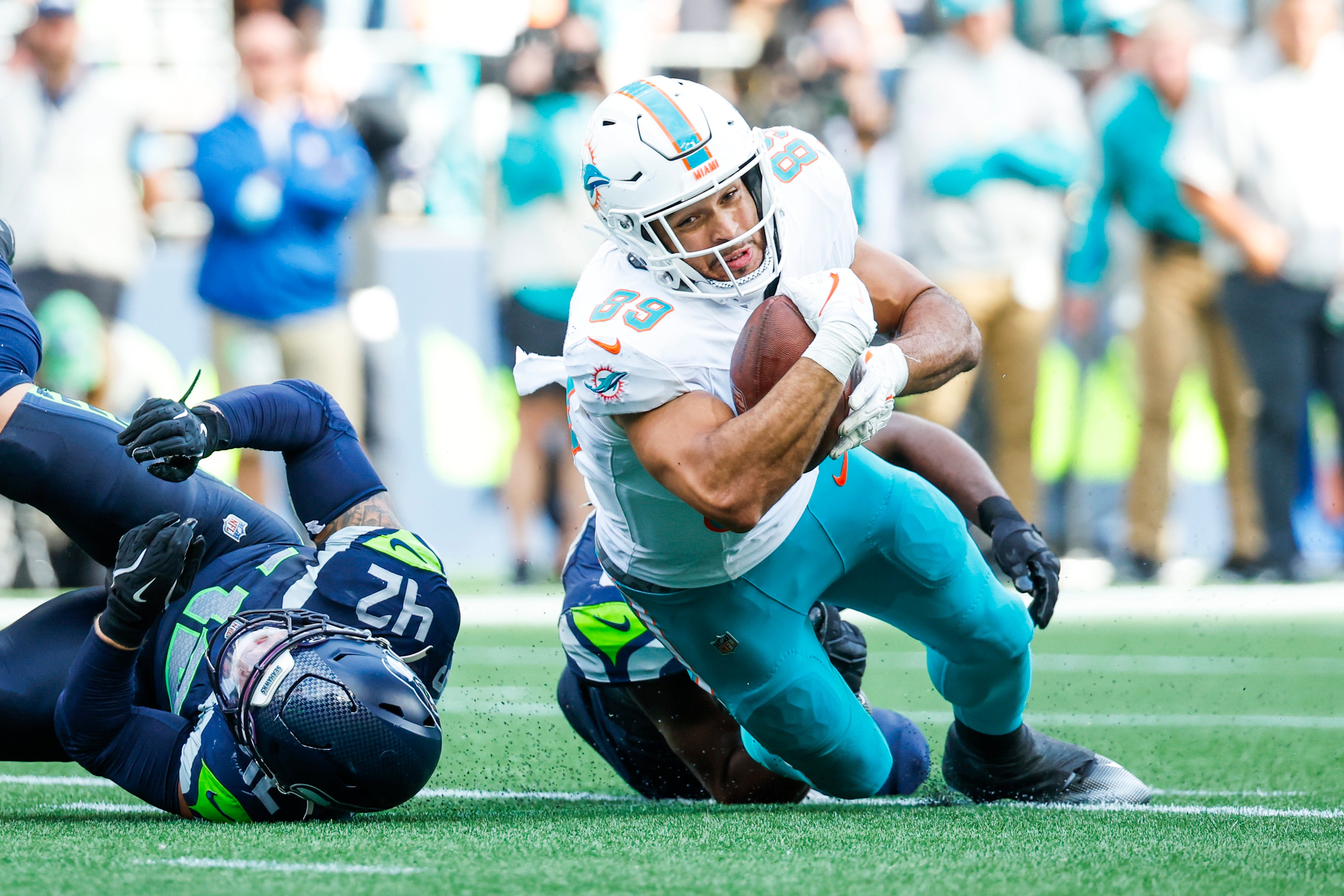Sep 22, 2024; Seattle, Washington, USA; Miami Dolphins tight end Julian Hill (89) runs for yards after the catch against the Seattle Seahawks during the fourth quarter at Lumen Field.