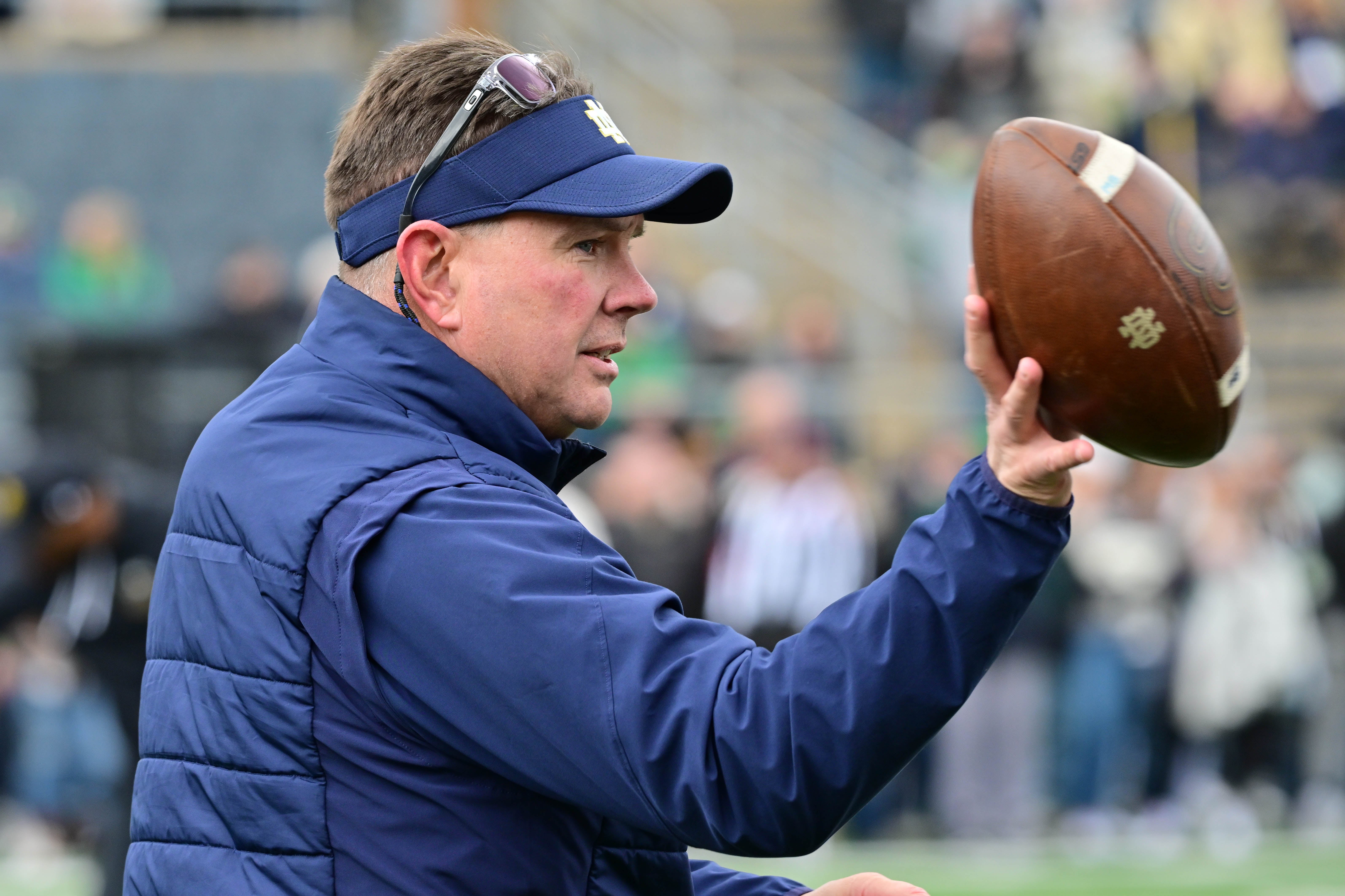 Apr 20, 2024; Notre Dame, IN, USA; Notre Dame Fighting Irish Defensive Coordinator Al Golden participates in warmups before the Blue-Gold Game at Notre Dame Stadium.