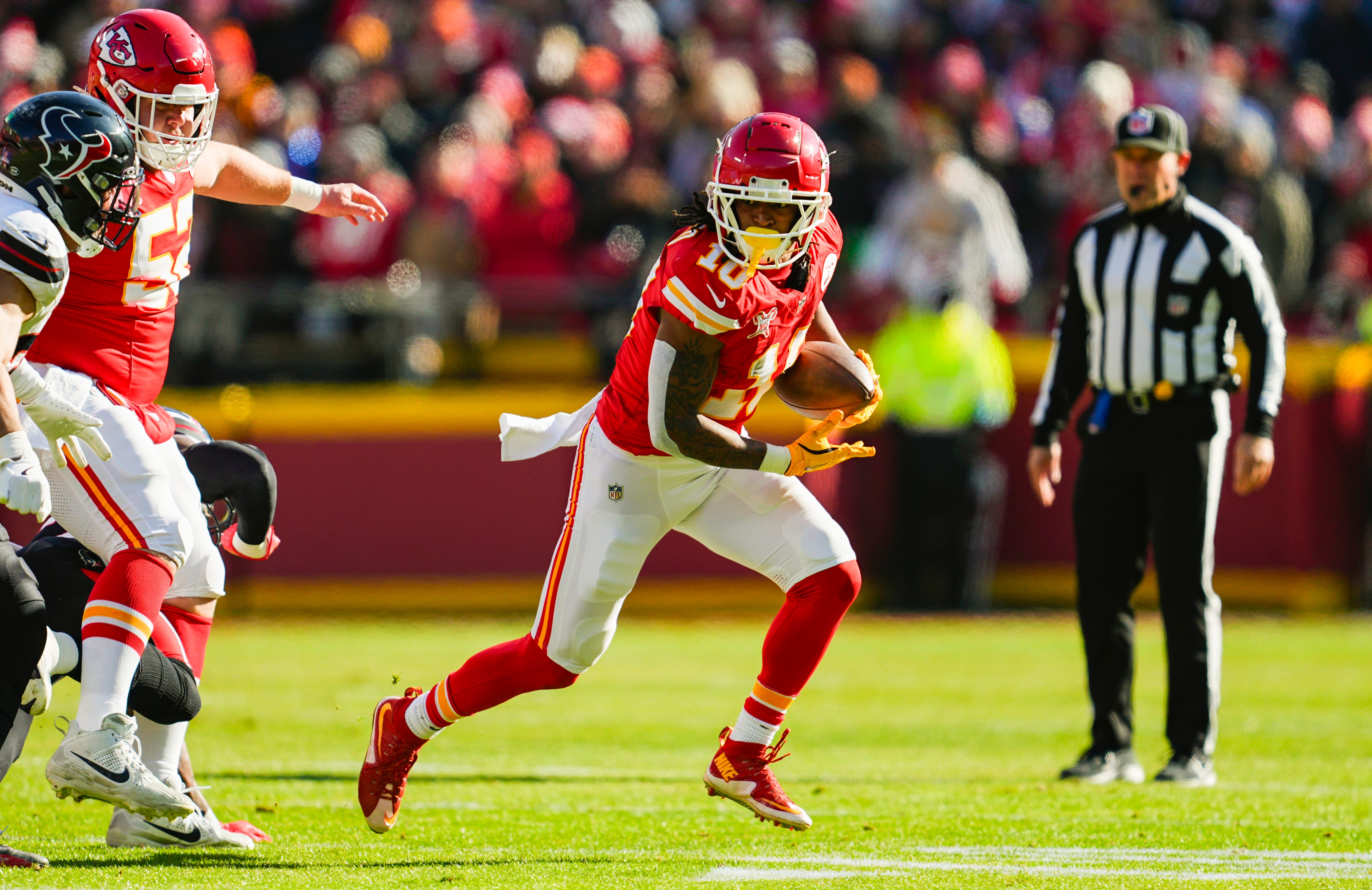 Dec 21, 2024; Kansas City, Missouri, USA; Kansas City Chiefs running back Isiah Pacheco (10) runs the ball during the first half against the Houston Texans at GEHA Field at Arrowhead Stadium.