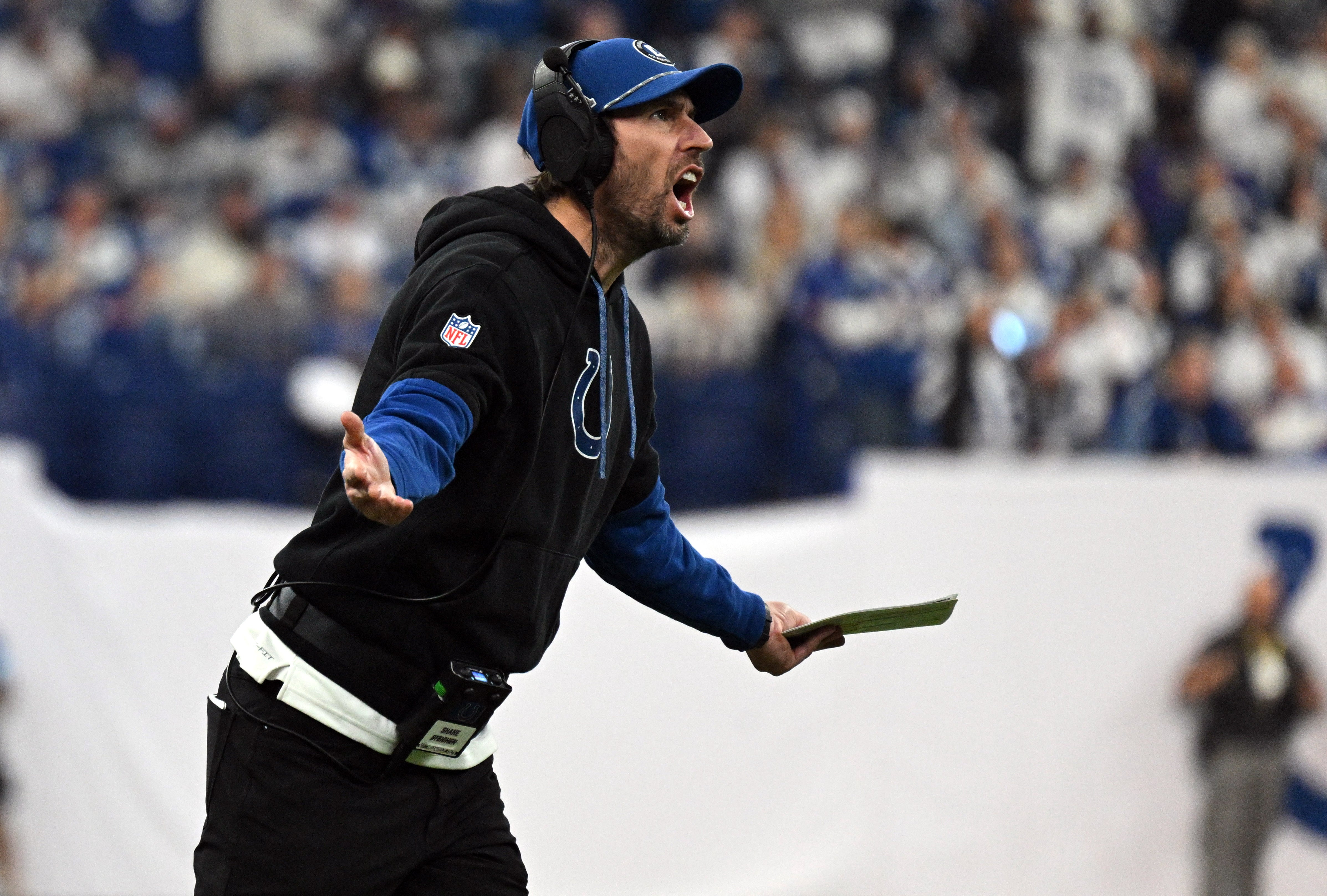 Dec 22, 2024; Indianapolis, Indiana, USA; Indianapolis Colts head coach Shane Steichen reacts to a call during the second half against the Tennessee Titans at Lucas Oil Stadium.