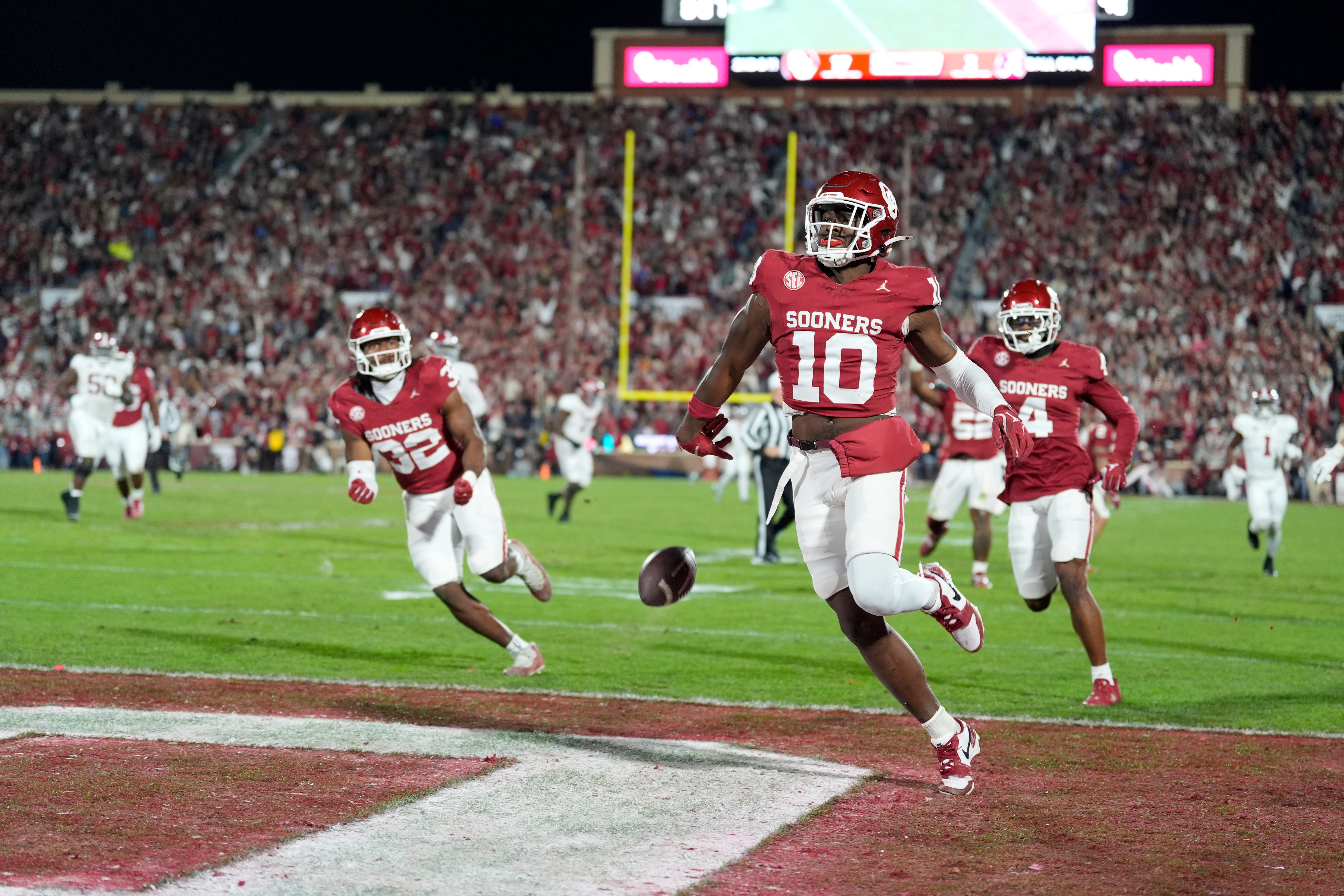 Oklahoma Sooners linebacker Kip Lewis (10) return an interception for a touchdown during a college football game between the University of Oklahoma Sooners (OU) and the Alabama Crimson Tide at Gaylord Family - Oklahoma Memorial Stadium in Norman, Okla., Saturday, Nov. 23, 2024. Oklahoma won 24-3.