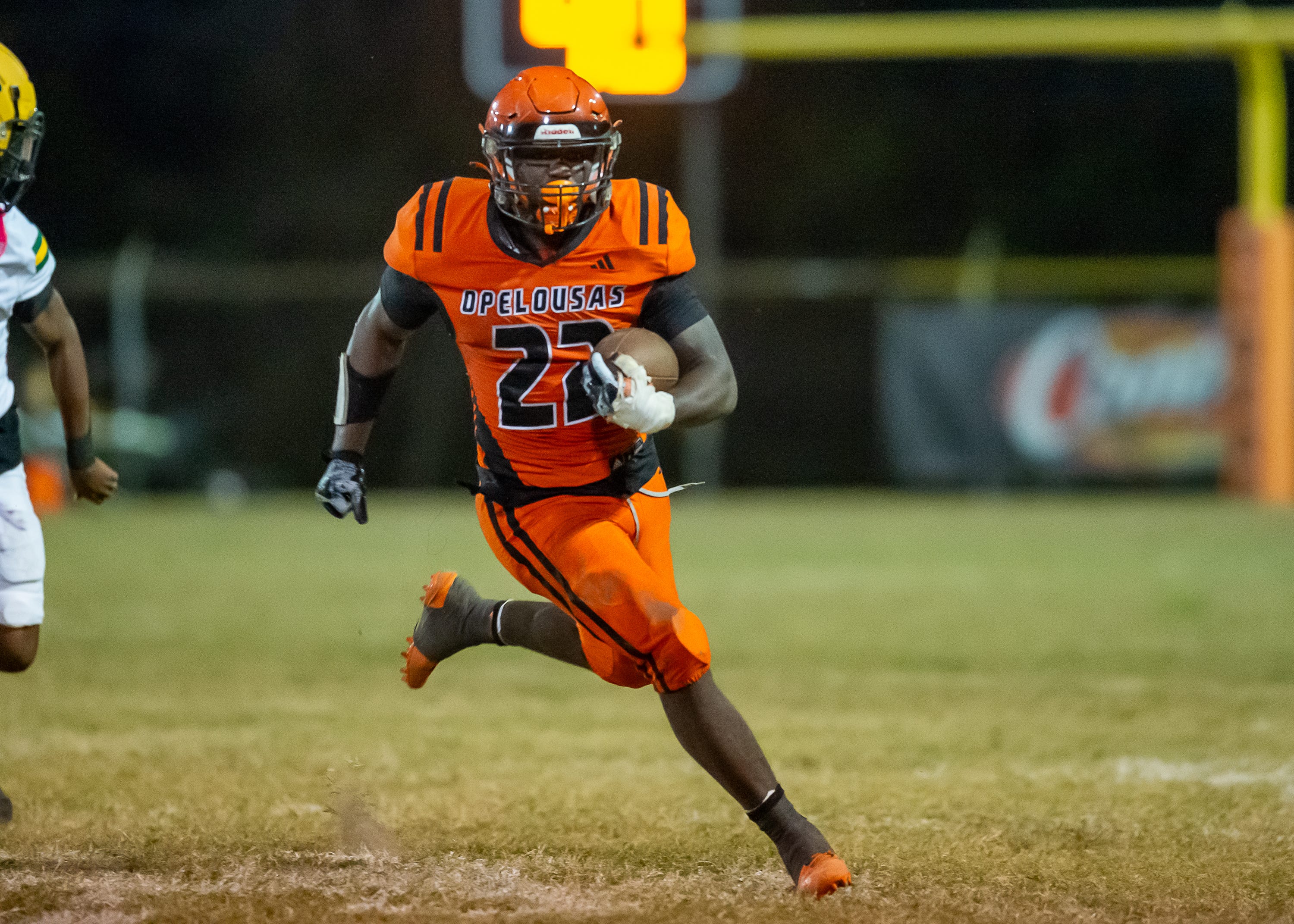 Tigers runningback D'shaun Ford 22 runs the ball as the Opelousas High Tigers take on the Cecilia Bulldogs. Friday, Oct. 25, 2024.