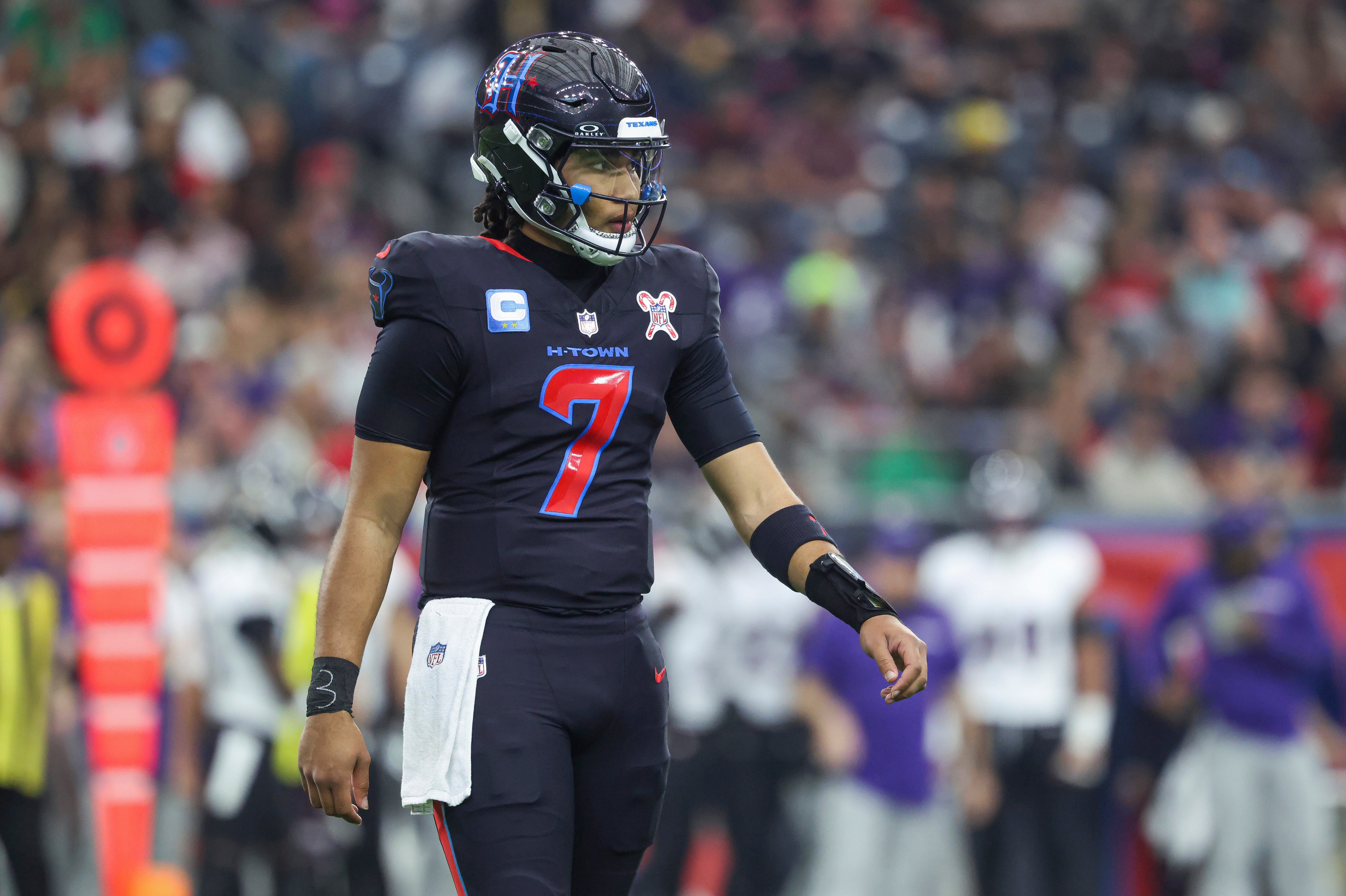 Dec 15, 2024; Houston, Texas, USA; Houston Texans quarterback C.J. Stroud (7) reacts after a play during the first quarter against the Baltimore Ravens at NRG Stadium.