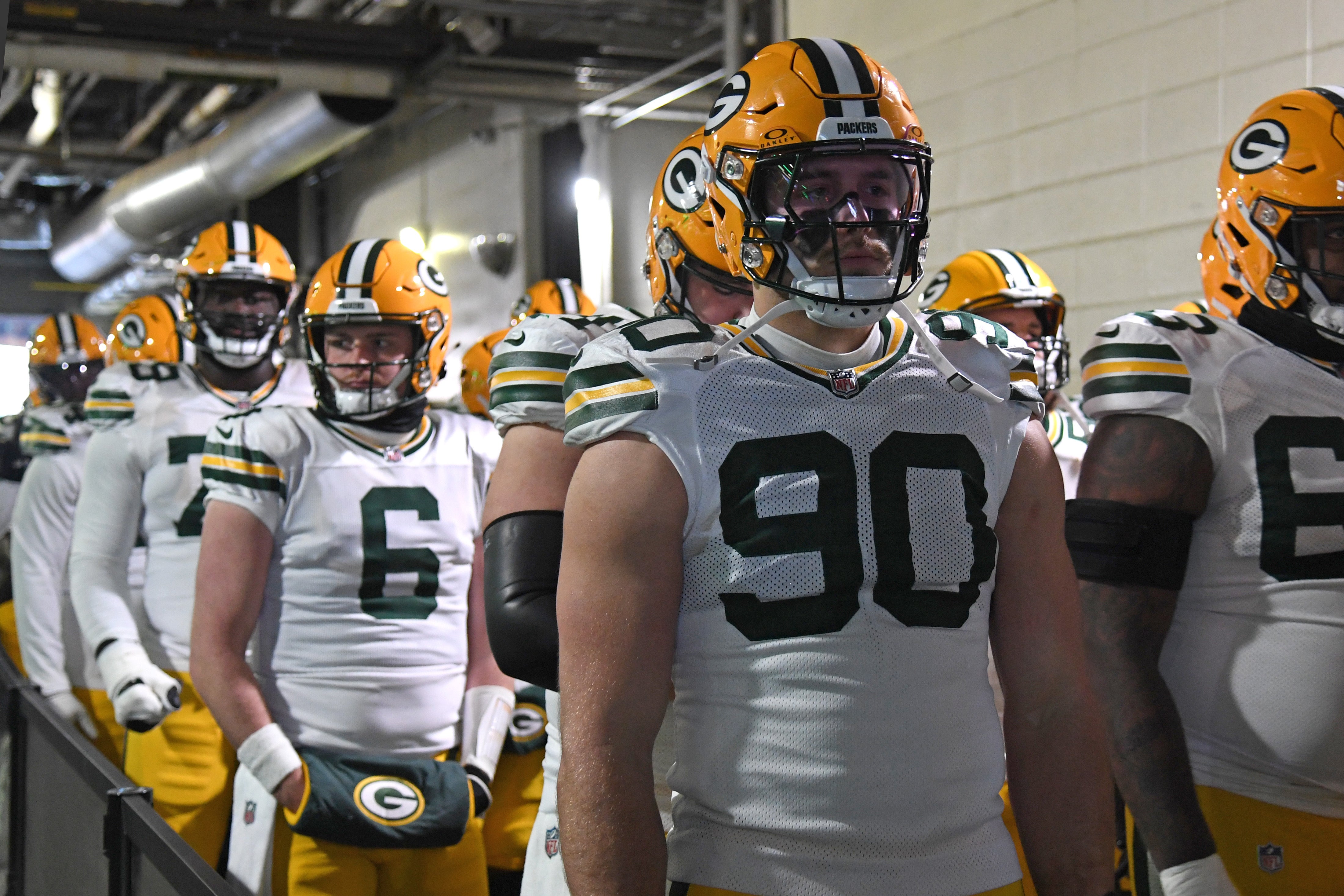 Green Bay Packers defensive end Lukas Van Ness (90) waits in the tunnel against the Philadelphia Eagles in an NFC wild card game at Lincoln Financial Field.