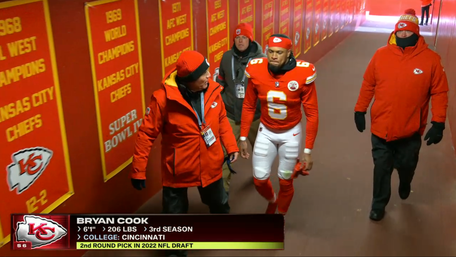 Chiefs S Bryan Cook walks in the tunnel to the locker room to be evaluated for a head injury.