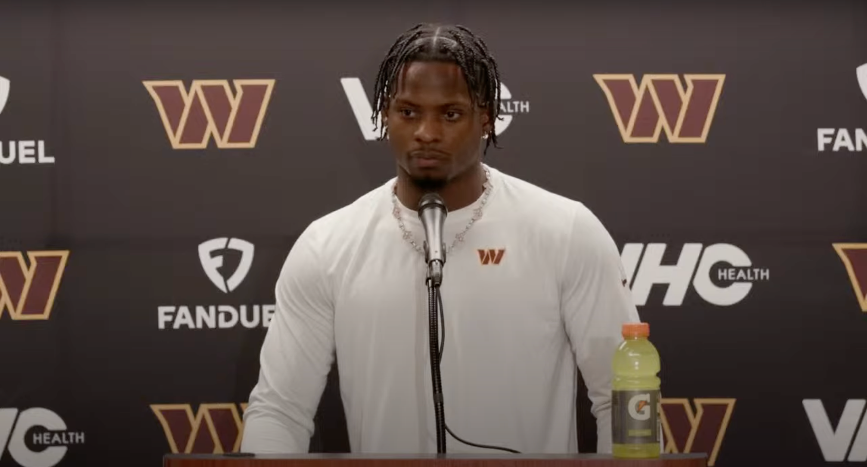 Brian Robinson Jr. speaks with reporters after the Commanders' playoff win over the Lions.