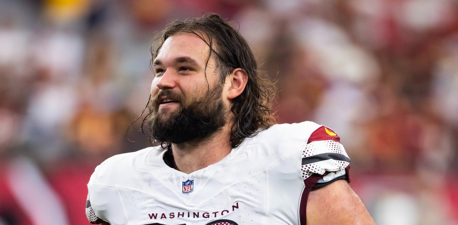Sep 29, 2024; Glendale, Arizona, USA; Washington Commanders guard Sam Cosmi (76) against the Arizona Cardinals at State Farm Stadium.
