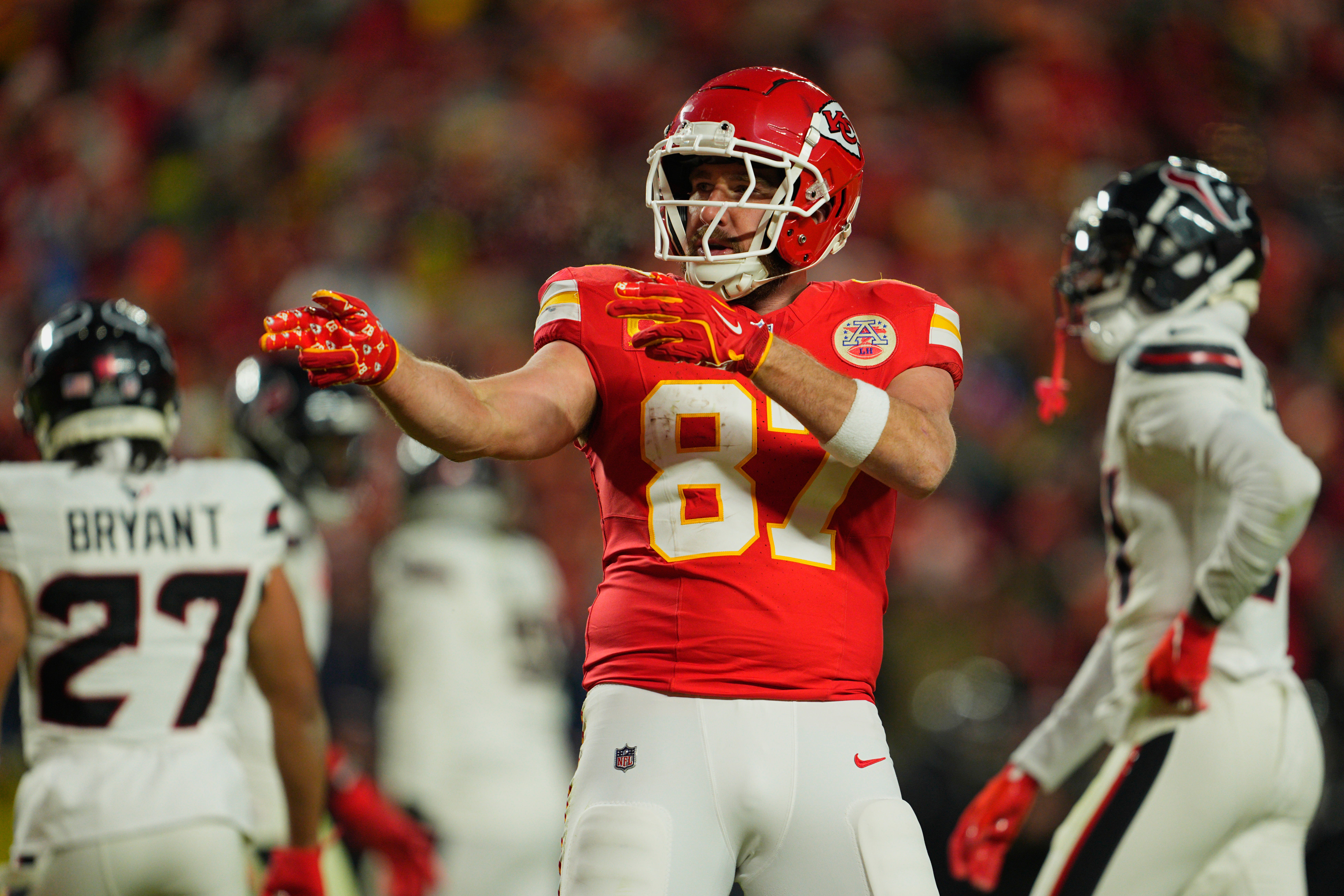 Jan 18, 2025; Kansas City, Missouri, USA; Kansas City Chiefs tight end Travis Kelce (87) reacts after a pass reception against the Houston Texans during the fourth quarter of a 2025 AFC divisional round game at GEHA Field at Arrowhead Stadium.