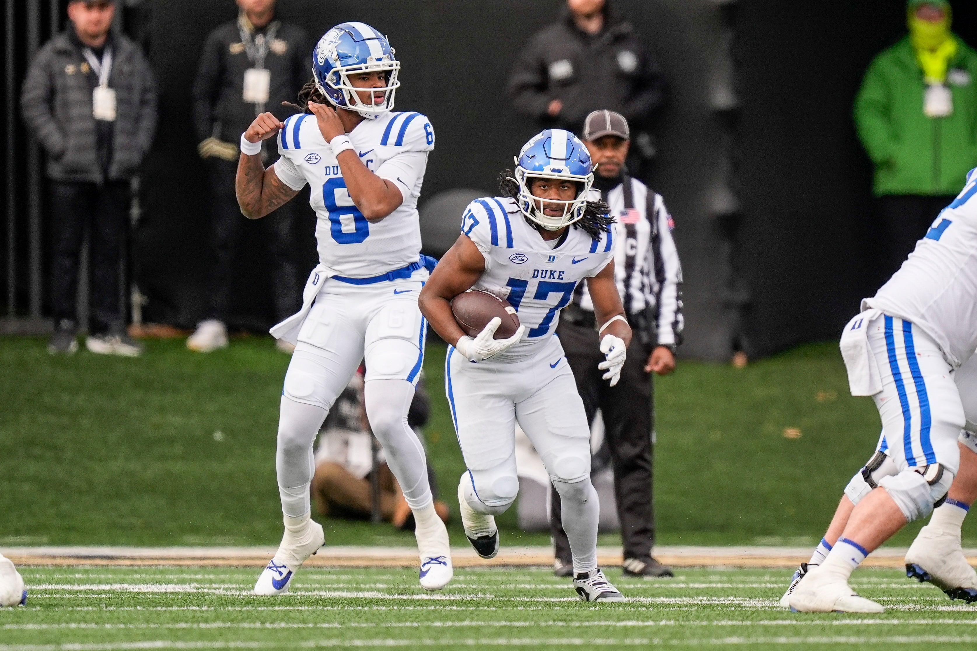 Nov 30, 2024; Winston-Salem, North Carolina, USA; Duke Blue Devils running back Star Thomas (17) runs for yardage against the Wake Forest Demon Deacons during the second half at Allegacy Federal Credit Union Stadium.