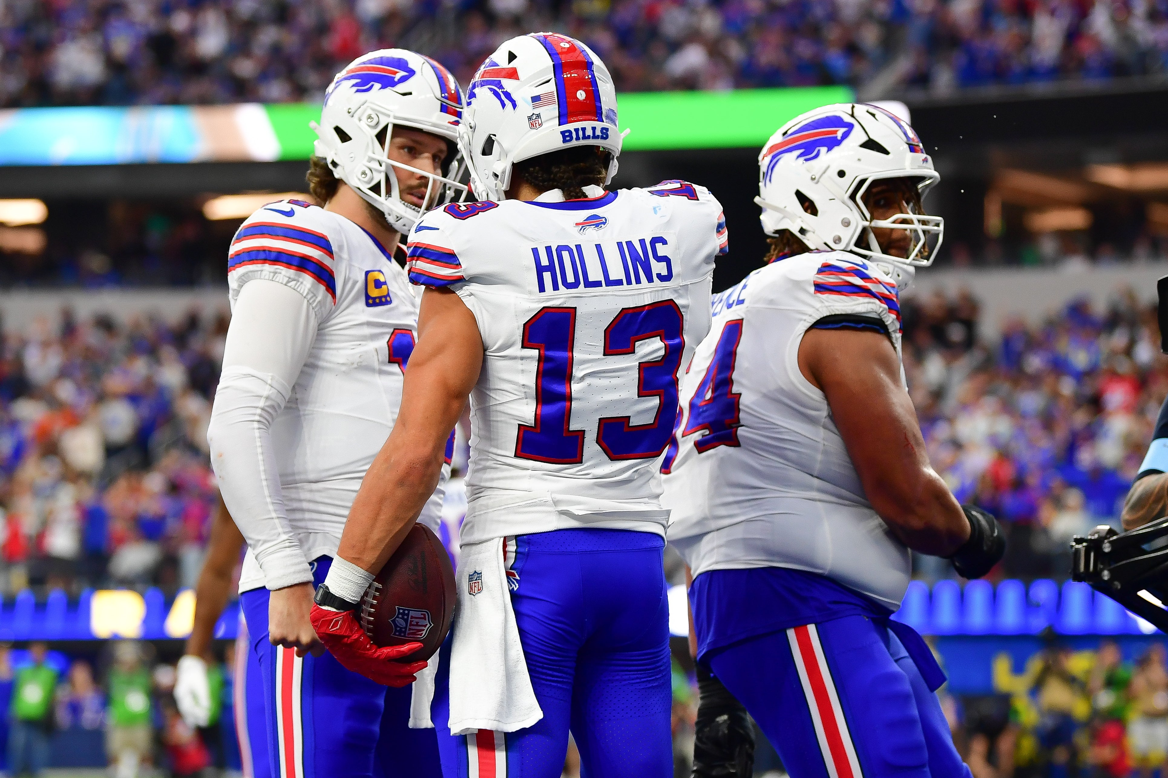 Buffalo Bills wide receiver Mack Hollins (13) celebrates his touchdown scored against the Los Angeles Rams with quarterback Josh Allen (17) during the second half at SoFi Stadium.