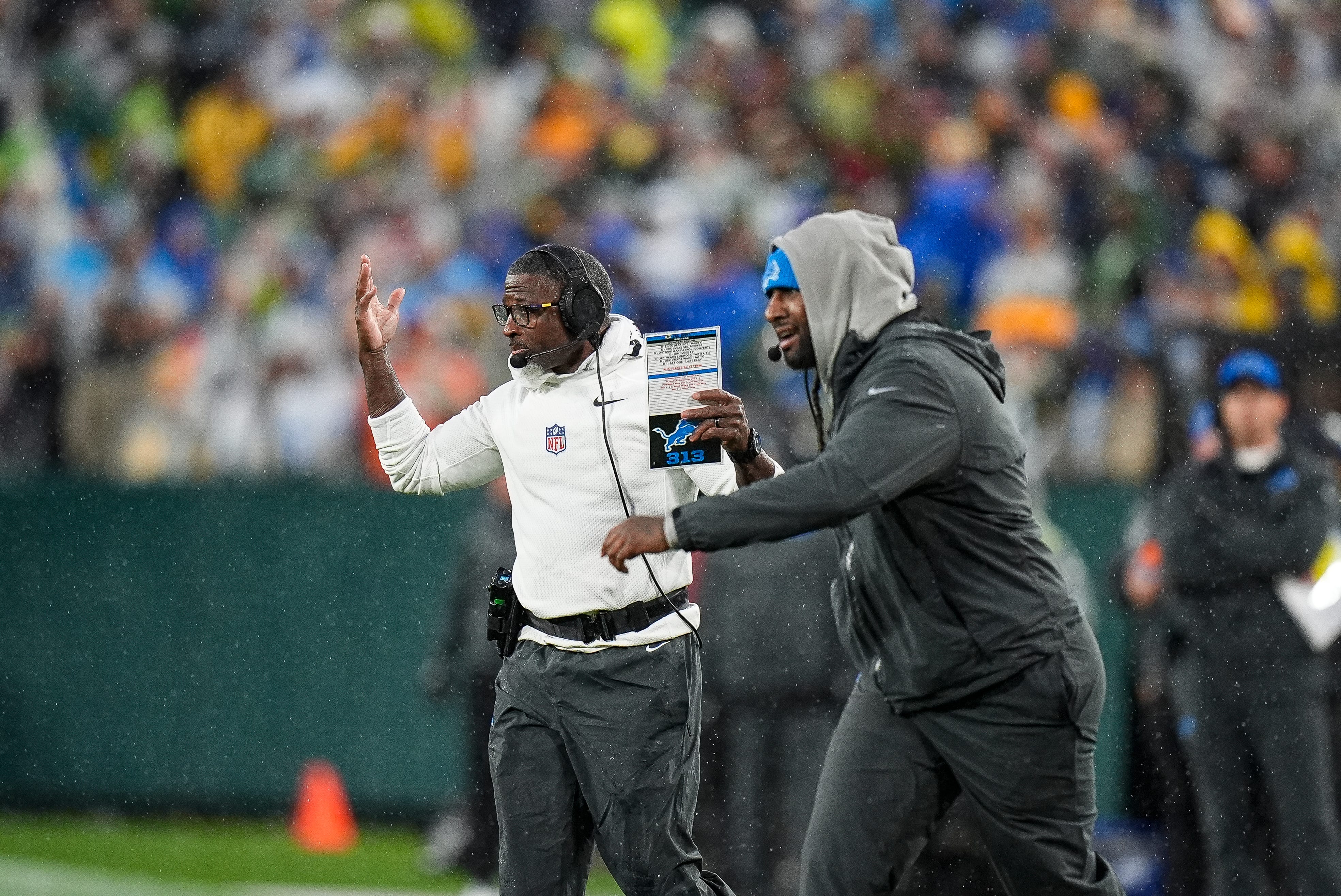 Detroit Lions defensive coordinator Aaron Glenn, left, and linebackers coach Kelvin Sheppard, right, react to a play against Green Bay Packers during the first half at Lambeau Field in Green Bay, Wis. on Sunday, Nov. 3, 2024.